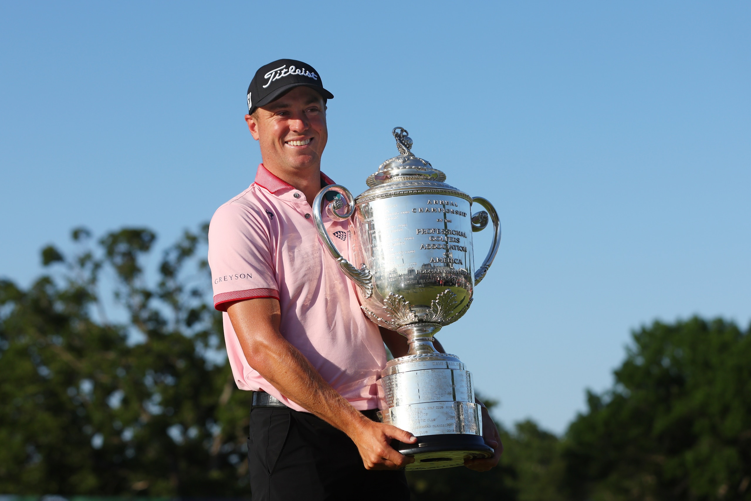 TULSA, OKLAHOMA - MAY 22: Justin Thomas of the United States poses with the Wanamaker Trophy after putting in to win on the 18th green, the third playoff hole during the final round of the 2022 PGA Championship at Southern Hills Country Club on May 22, 2022 in Tulsa, Oklahoma. (Photo by Andrew Redington/Getty Images)