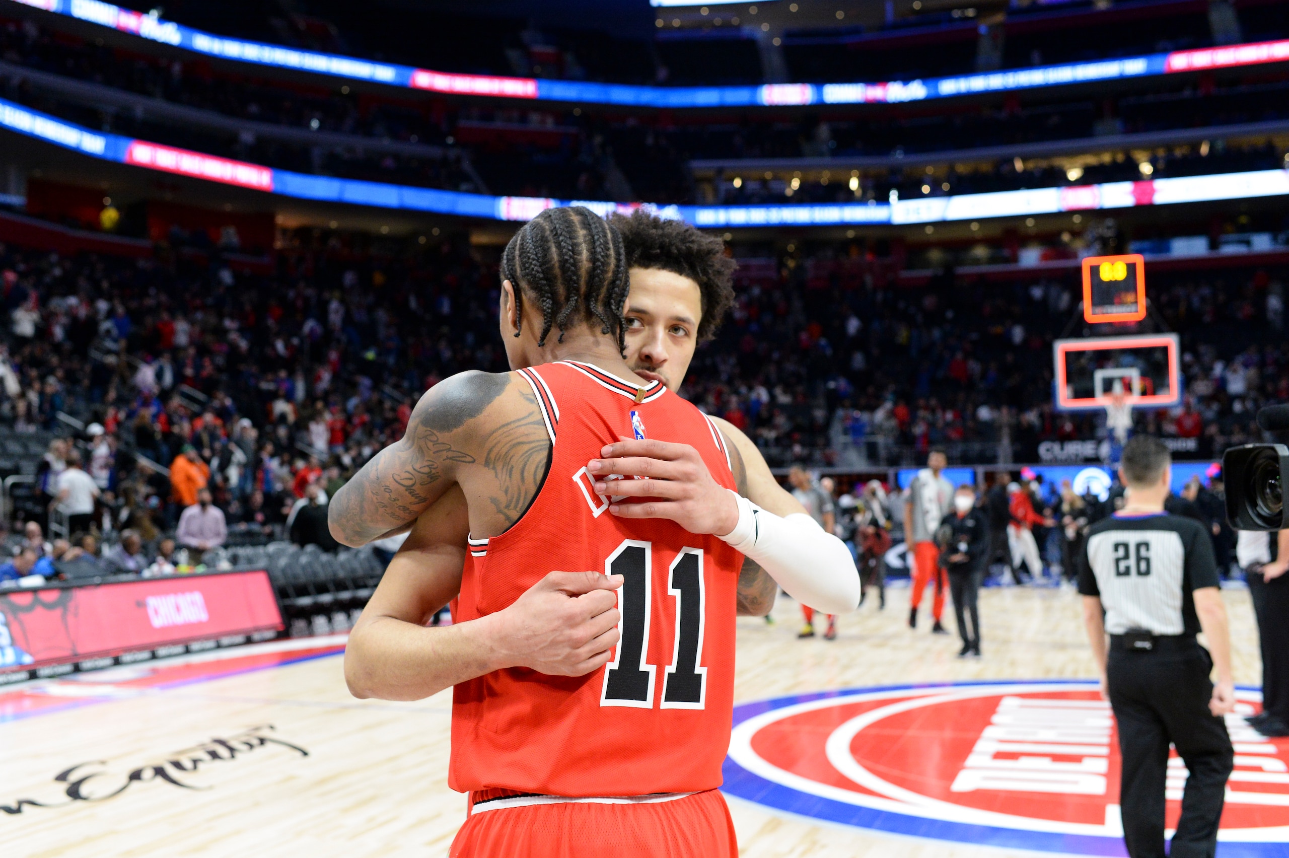 DETROIT, MI - MARCH 09: DeMar DeRozan #11 of the Chicago Bulls hugs Cade Cunningham #2 of the Detroit Pistons after the game on March 09, 2022 at Little Caesars Arena in Detroit, Michigan. NOTE TO USER: User expressly acknowledges and agrees that, by downloading and/or using this photograph, User is consenting to the terms and conditions of the Getty Images License Agreement. Mandatory Copyright Notice: Copyright 2022 NBAE (Photo by Chris Schwegler/NBAE via Getty Images)