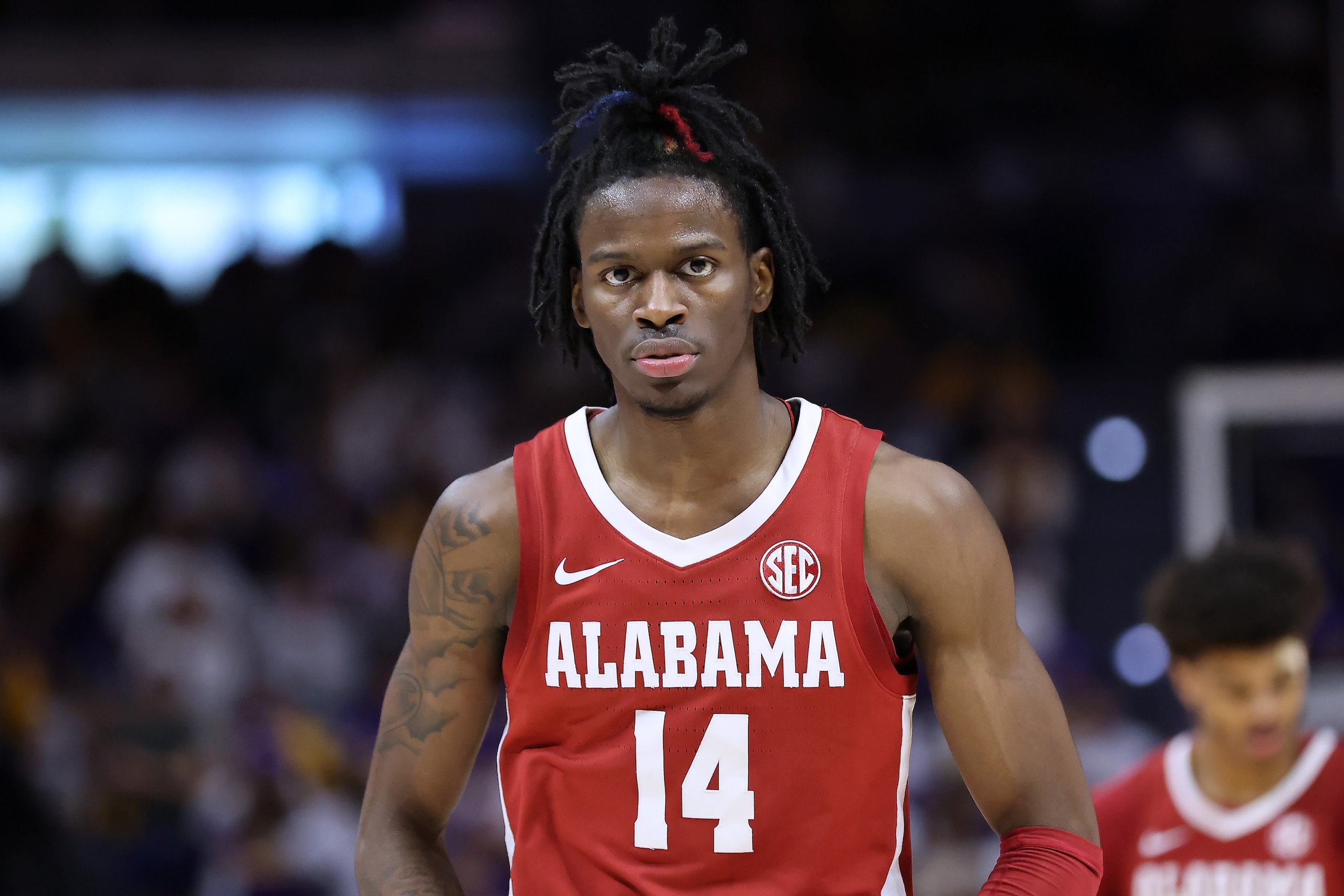 BATON ROUGE, LOUISIANA - MARCH 05: Keon Ellis #14 of the Alabama Crimson Tide reacts against the LSU Tigers during a game at the Pete Maravich Assembly Center on March 05, 2022 in Baton Rouge, Louisiana. (Photo by Jonathan Bachman/Getty Images)