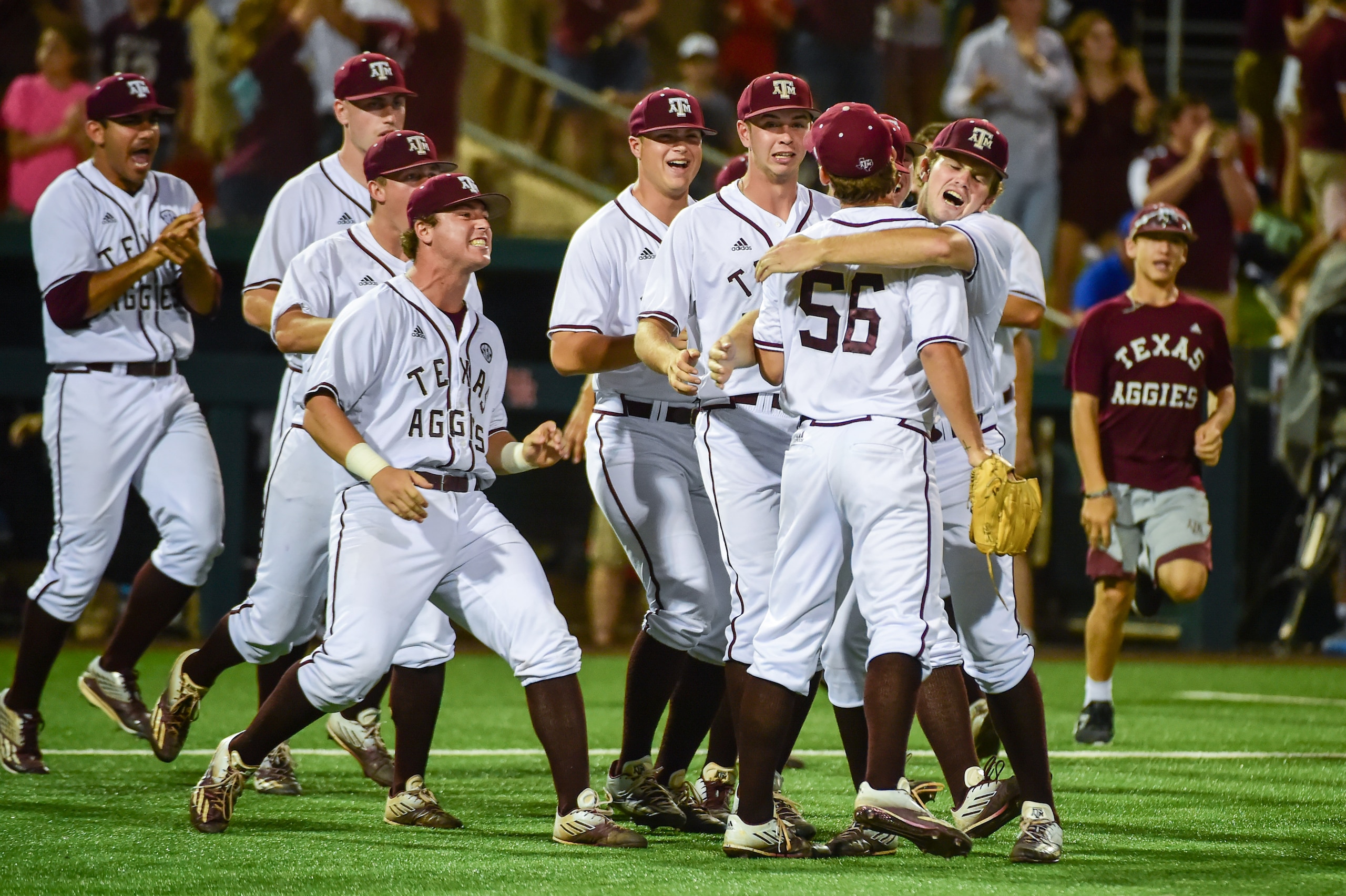 HOUSTON, TX - JUNE 03: Texas A&M Aggies pitcher Kaylor Chafin (56) is swarmed by Aggie players after preserving his save and the 3-2 victory over Iowa during the Houston Regional baseball game between the Iowa Hawkeyes  and the Texas A&M Aggies on June 3, 2017 at Schroeder Park in Houston, Texas. (Photo by Ken Murray/Icon Sportswire via Getty Images)