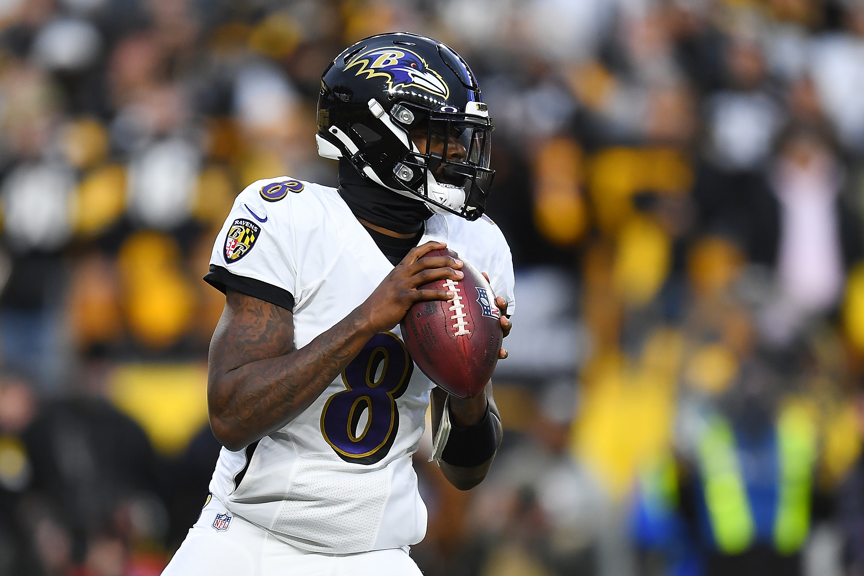 Ravens QB Lamar Jackson reports for training camp amid contract uncertainty