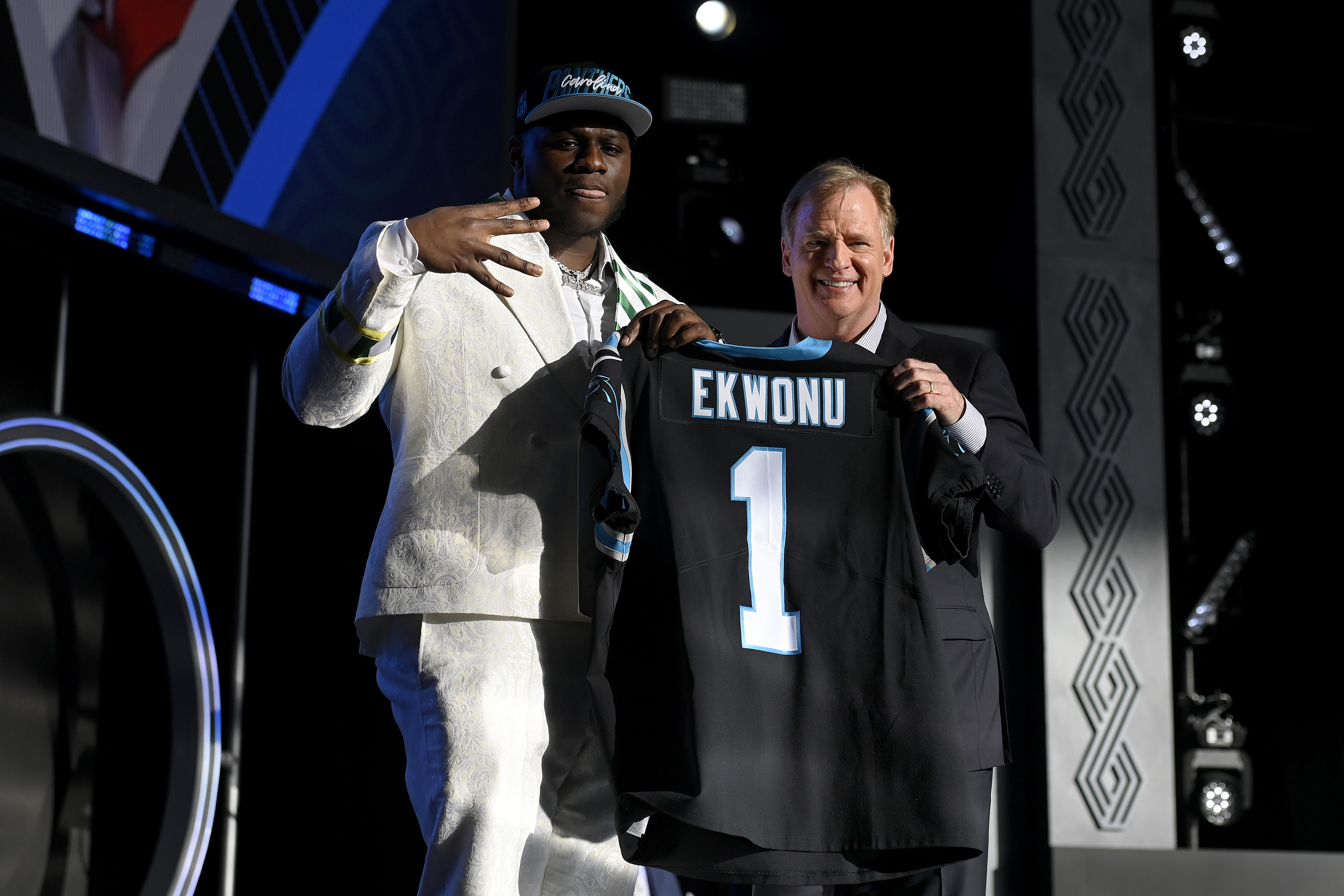 LAS VEGAS, NEVADA - APRIL 28: (L-R) Ikem Ekwonu poses with NFL Commissioner Roger Goodell onstage after being selected sixth by the Carolina Panthers during round one of the 2022 NFL Draft on April 28, 2022 in Las Vegas, Nevada. (Photo by David Becker/Getty Images)