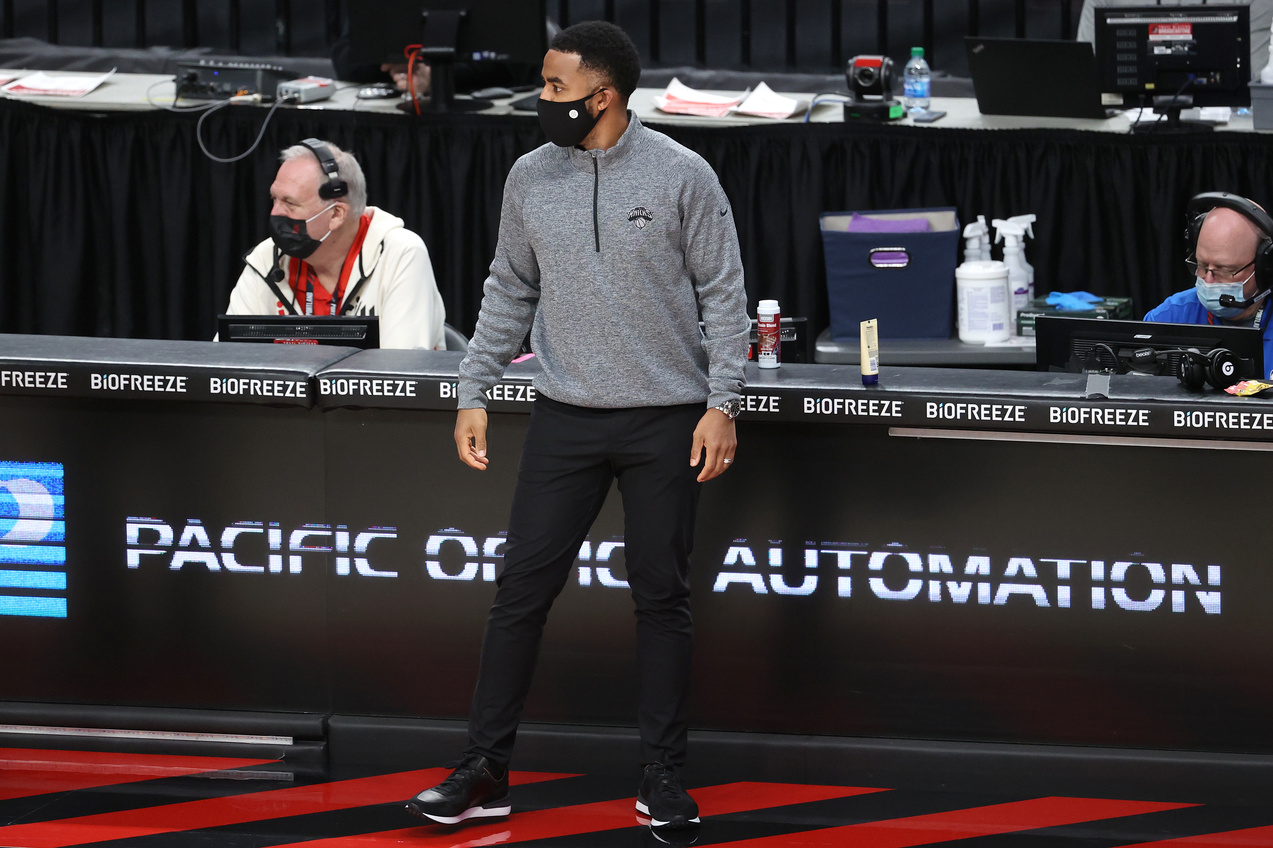 PORTLAND, OREGON - JANUARY 24: Associate Head Coach Johnnie Bryant of the New York Knicks looks on in the fourth quarter against the Portland Trail Blazers at Moda Center on January 24, 2021 in Portland, Oregon. NOTE TO USER: User expressly acknowledges and agrees that, by downloading and or using this photograph, User is consenting to the terms and conditions of the Getty Images License Agreement. (Photo by Abbie Parr/Getty Images)