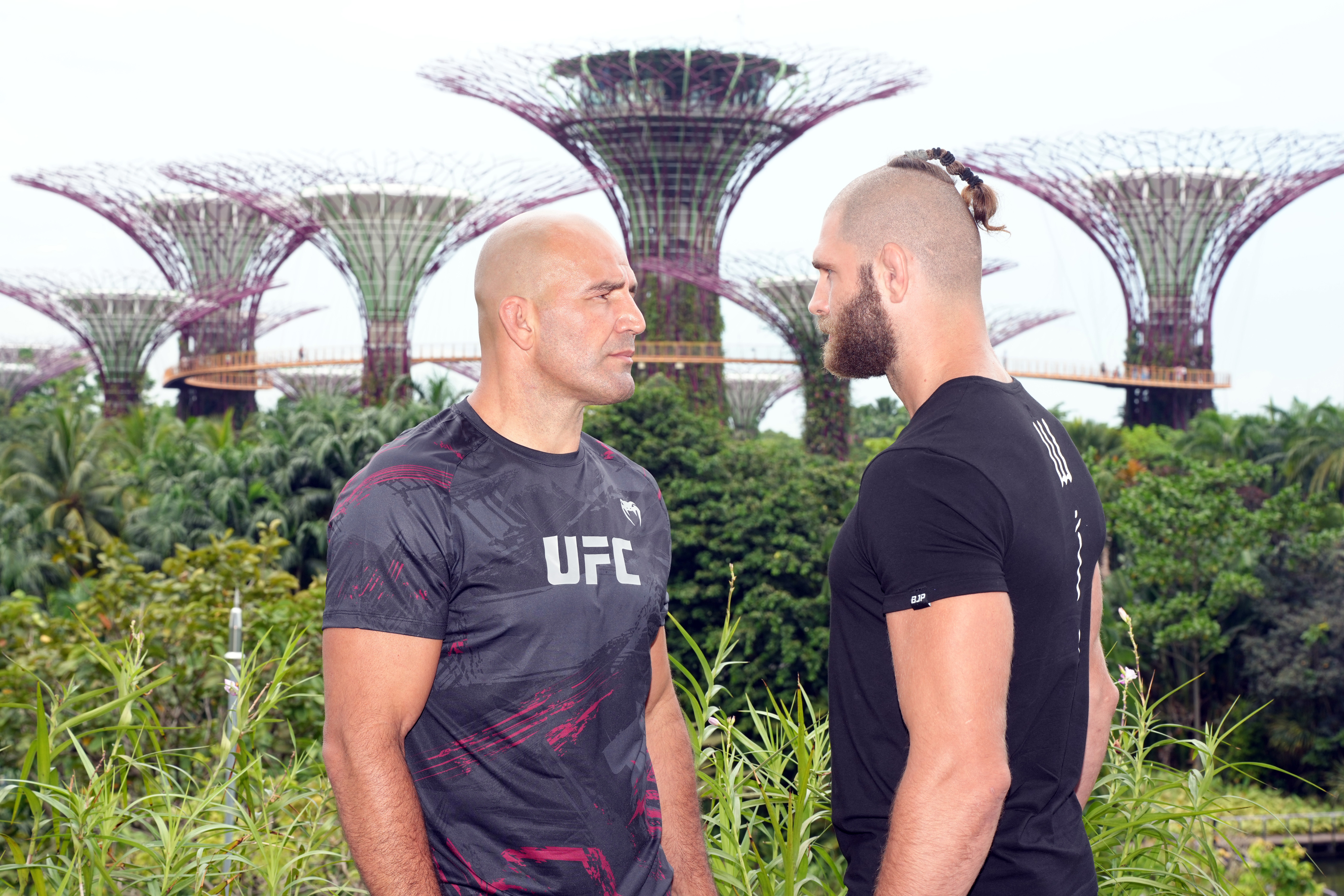 SINGAPORE, SINGAPORE - JUNE 07: (L-R) UFC light heavyweight champion Glover Texeira of Brazil and Jiri Prochazka of Czech Republic face off during a UFC photo session at Gardens by the Bay on June 7, 2022 in Singapore. (Photo by Jeff Bottari/Zuffa LLC)