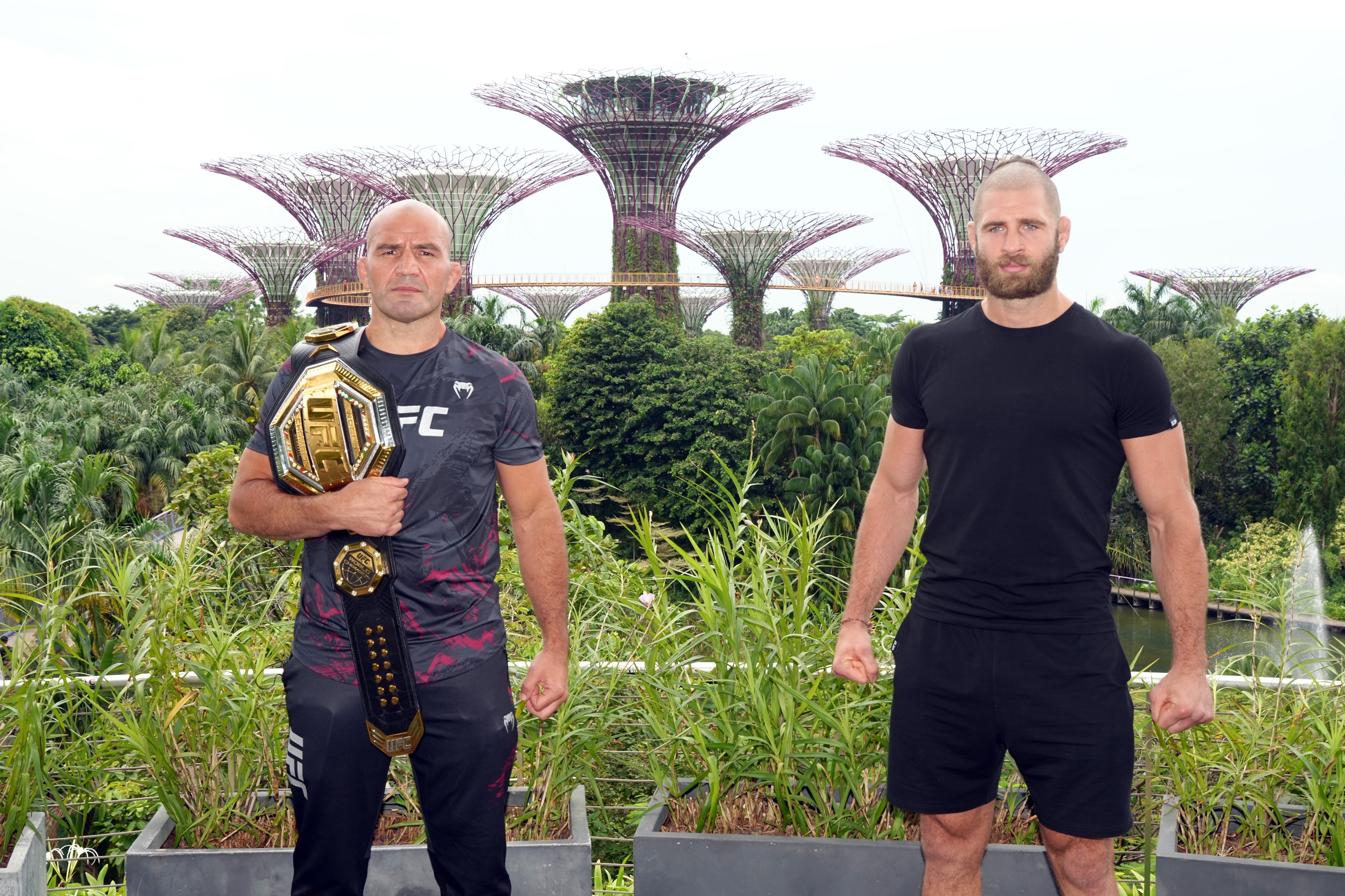 SINGAPORE, SINGAPORE - JUNE 07: (L-R) UFC light heavyweight champion Glover Texeira of Brazil and Jiri Prochazka of Czech Republic pose during a UFC photo session at Gardens by the Bay on June 7, 2022 in Singapore. (Photo by Jeff Bottari/Zuffa LLC) SINGAPORE, SINGAPORE - JUNE 07: (L-R) UFC light heavyweight champion Glover Texeira of Brazil and Jiri Prochazka of Czech Republic pose during a UFC photo session at Gardens by the Bay on June 7, 2022 in Singapore. (Photo by Jeff Bottari/Zuffa LLC)