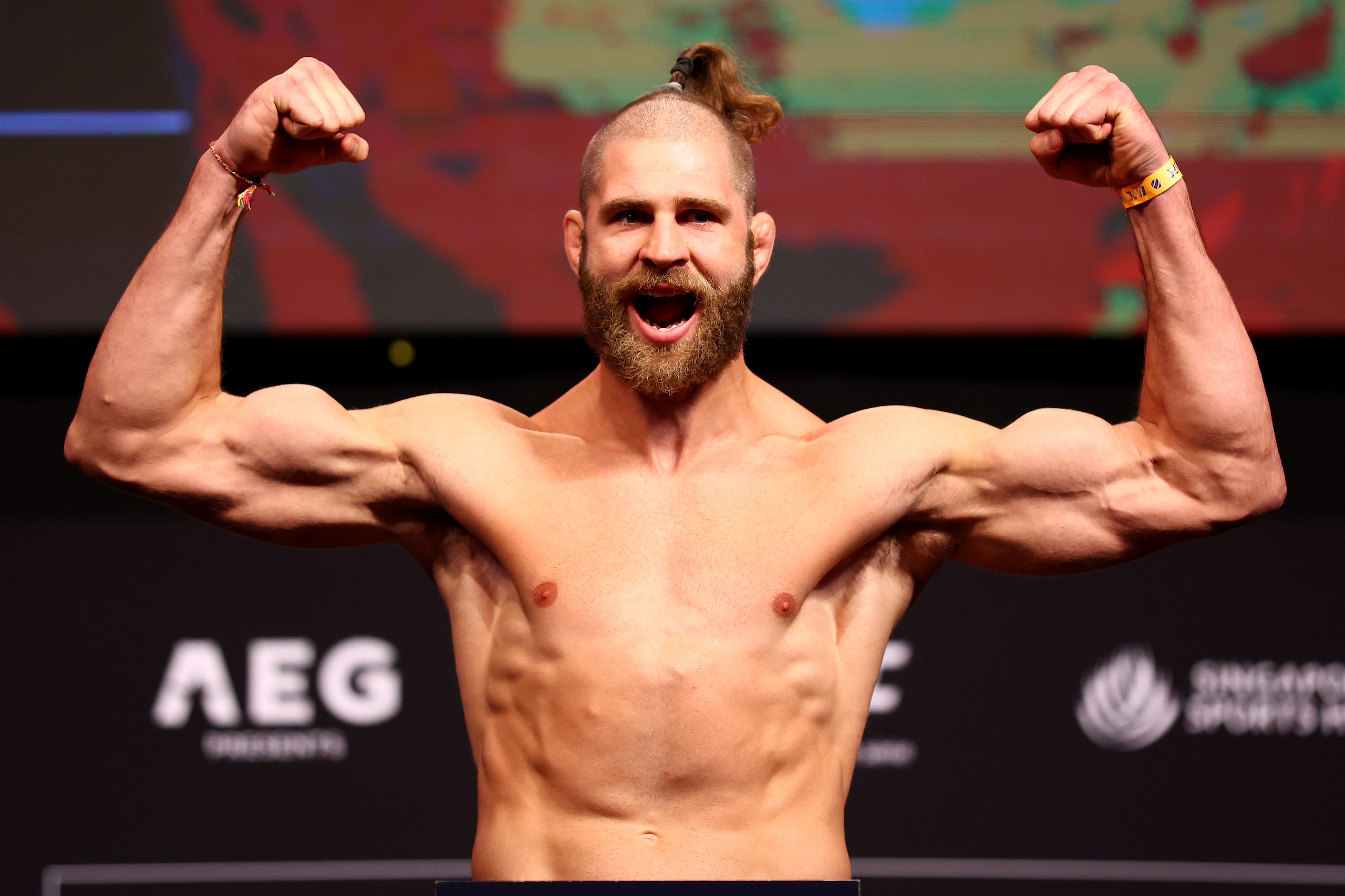 SINGAPORE, SINGAPORE - JUNE 10: Jiri Prochazka of the Czech Republic poses on the scale ahead of his light heavyweight title bout against Glover Teixeira of Brazil during the UFC 275 Weigh-in at Singapore Indoor Stadium on June 10, 2022 in Singapore. (Photo by Yong Teck Lim/Getty Images)