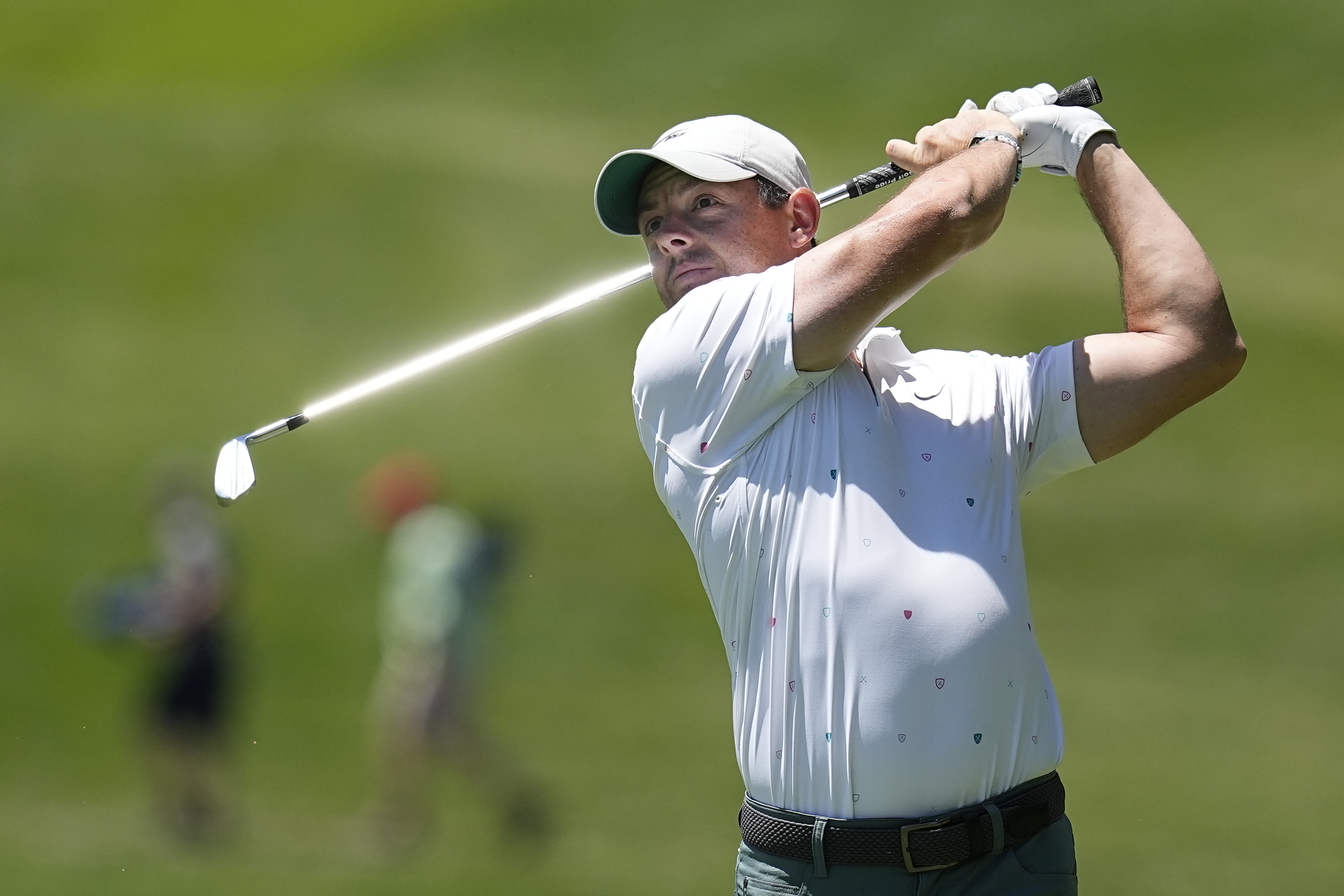 Rory McIlroy, of Northern Ireland, hits from the first fairway during the third round of the Memorial golf tournament Saturday, June 4, 2022, in Dublin, Ohio. (AP Photo/Darron Cummings)