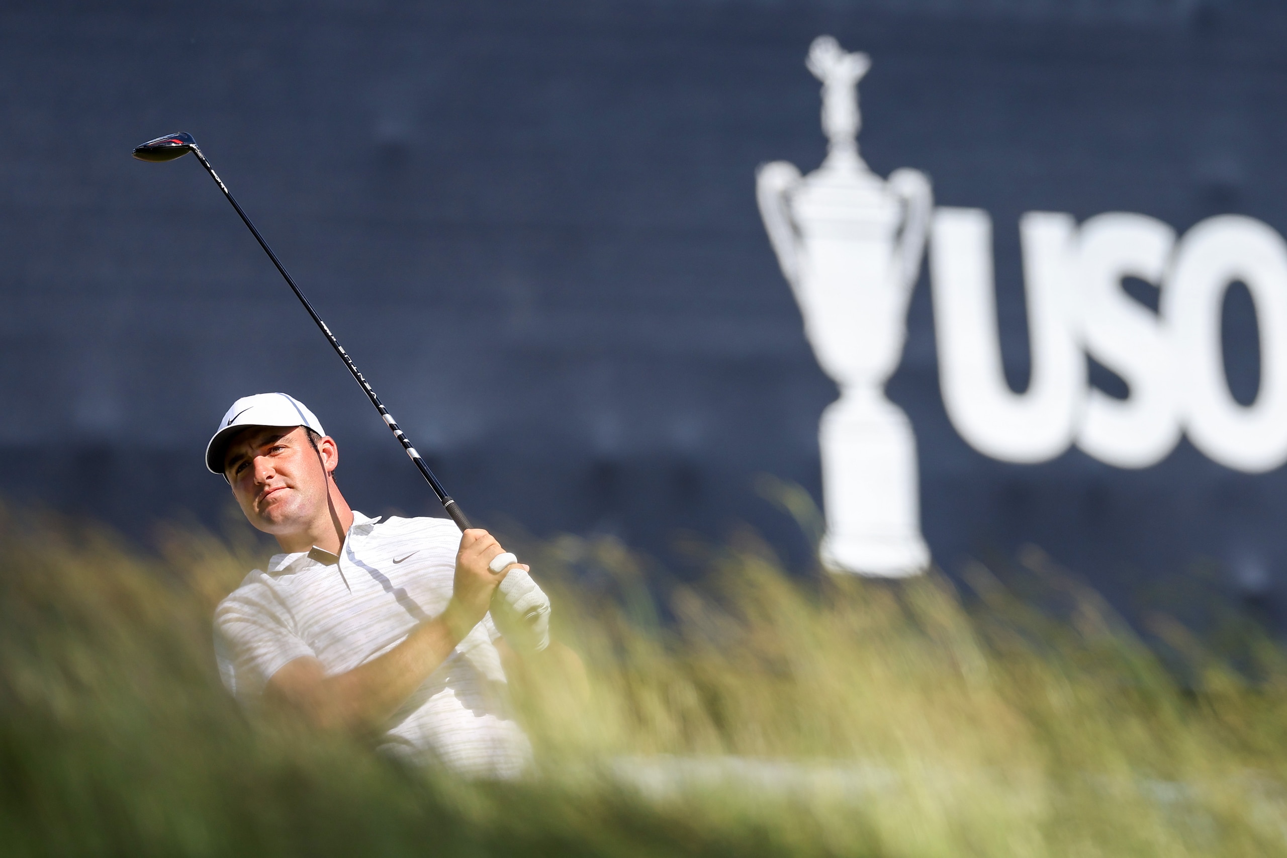 BROOKLINE, MASSACHUSETTS - JUNE 13: Scottie Scheffler of the United States plays his shot from the 13th tee during a practice round prior to the 2022 U.S. Open at The Country Club on June 13, 2022 in Brookline, Massachusetts. (Photo by Rob Carr/Getty Images) BROOKLINE, MASSACHUSETTS - JUNE 13: Scottie Scheffler of the United States plays his shot from the 13th tee during a practice round prior to the 2022 U.S. Open at The Country Club on June 13, 2022 in Brookline, Massachusetts. (Photo by Rob Carr/Getty Images)