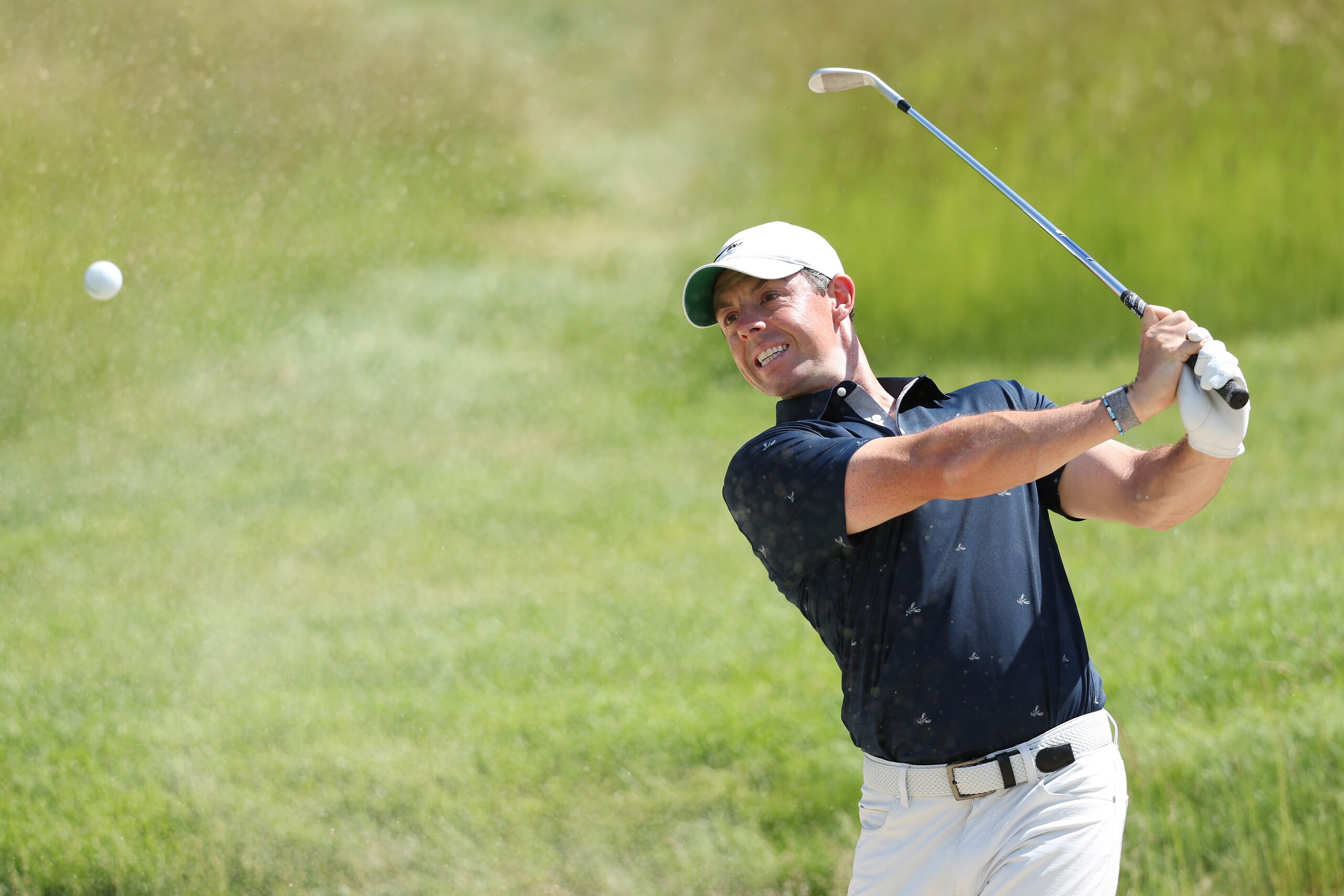BROOKLINE, MASSACHUSETTS - JUNE 13: Rory McIlroy of Northern Ireland plays a shot on the third hole during a practice round prior to the 2022 U.S. Open at The Country Club on June 13, 2022 in Brookline, Massachusetts. (Photo by Warren Little/Getty Images) BROOKLINE, MASSACHUSETTS - JUNE 13: Rory McIlroy of Northern Ireland plays a shot on the third hole during a practice round prior to the 2022 U.S. Open at The Country Club on June 13, 2022 in Brookline, Massachusetts. (Photo by Warren Little/Getty Images)