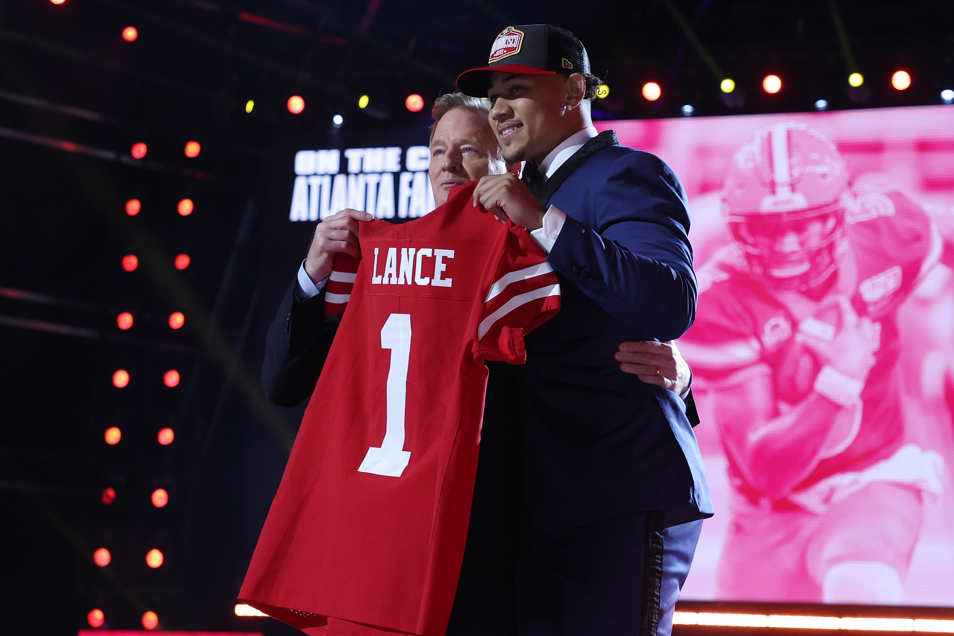 CLEVELAND, OHIO - APRIL 29: Trey Lance poses with NFL Commissioner Roger Goodell onstage after being selected third by the San Francisco 49ers during round one of the 2021 NFL Draft at the Great Lakes Science Center on April 29, 2021 in Cleveland, Ohio. (Photo by Gregory Shamus/Getty Images)