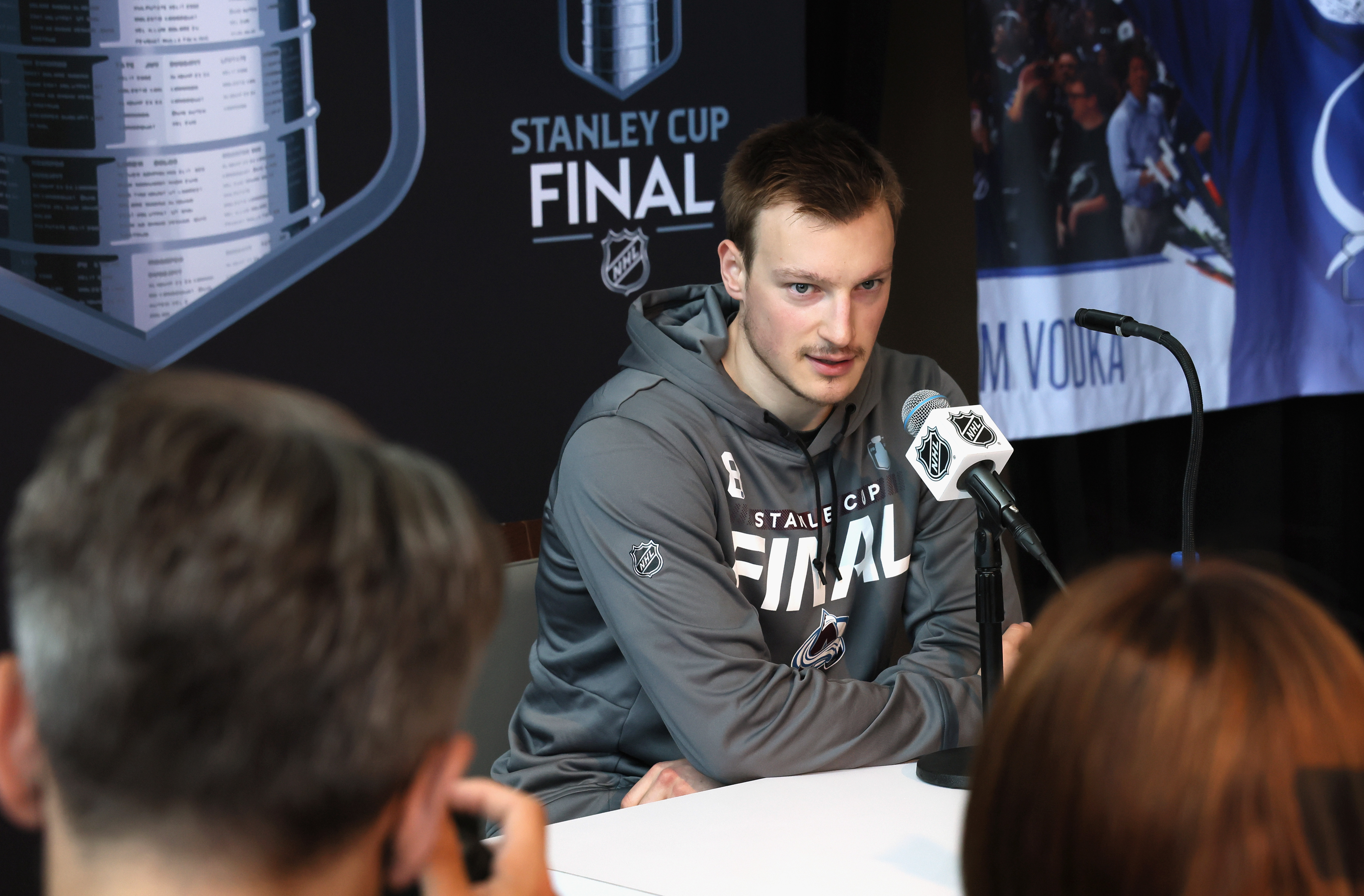 DENVER, COLORADO - JUNE 14: Cale Makar #8 of the Colorado Avalanche speaks with the media during the 2022 NHL Stanley Cup Final Media Day at Ball Arena on June 14, 2022 in Denver, Colorado. (Photo by Bruce Bennett/Getty Images)
