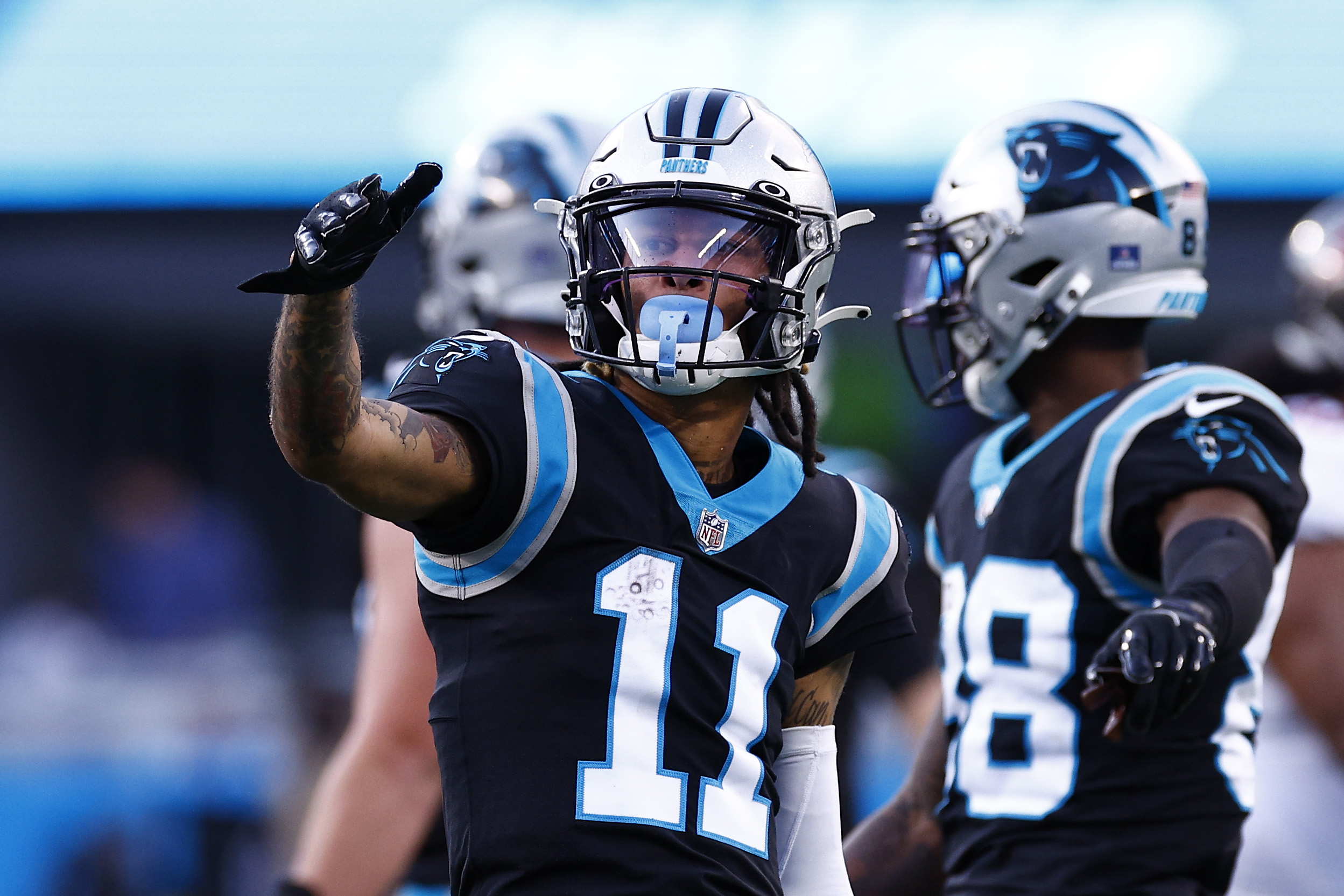 CHARLOTTE, NORTH CAROLINA - DECEMBER 26: Robby Anderson #11 of the Carolina Panthers reacts following a catch during the second half of the game against the Tampa Bay Buccaneers at Bank of America Stadium on December 26, 2021 in Charlotte, North Carolina. (Photo by Jared C. Tilton/Getty Images)