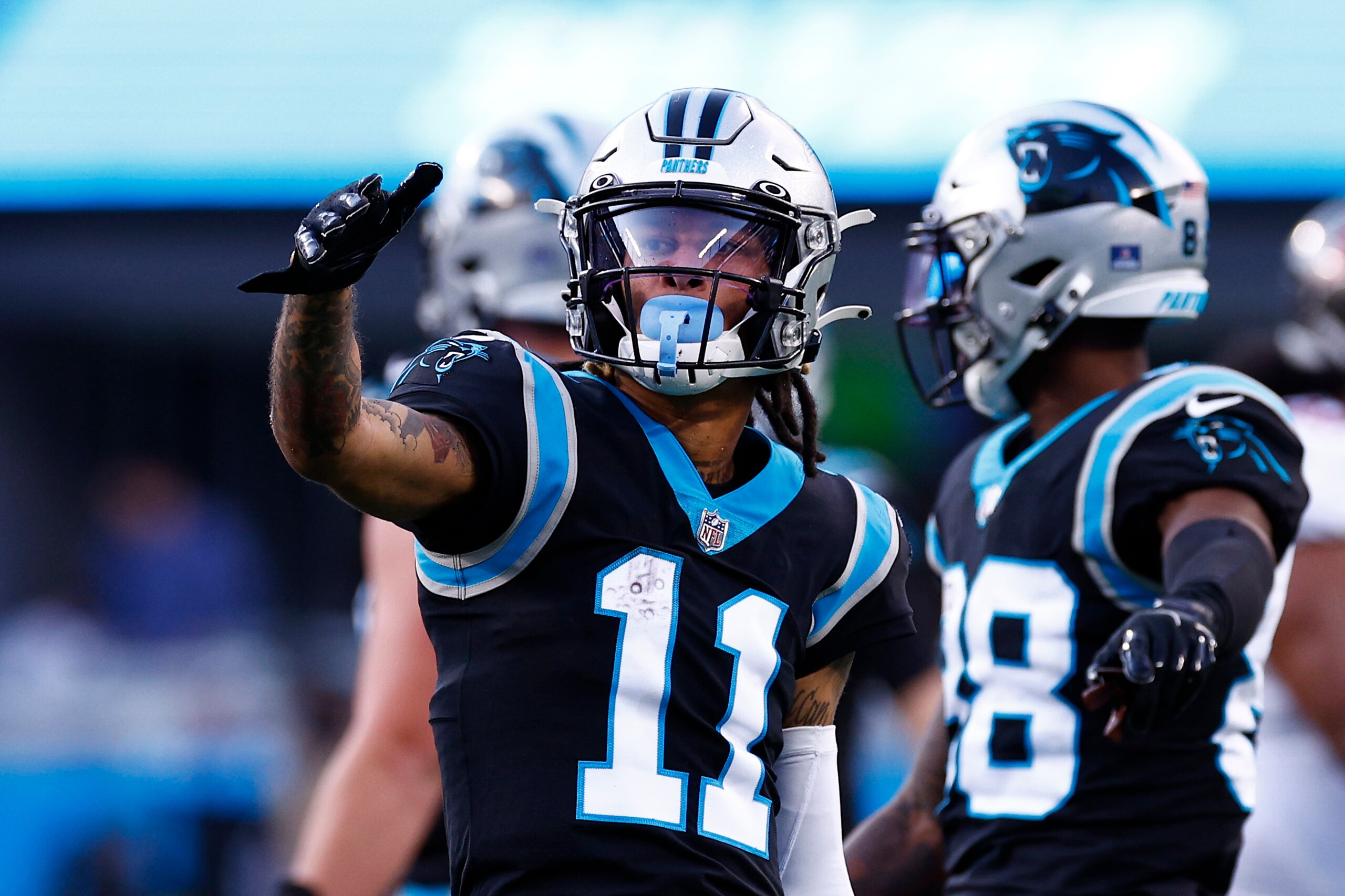 CHARLOTTE, NORTH CAROLINA - DECEMBER 26: Robby Anderson #11 of the Carolina Panthers reacts following a catch during the second half of the game against the Tampa Bay Buccaneers at Bank of America Stadium on December 26, 2021 in Charlotte, North Carolina. (Photo by Jared C. Tilton/Getty Images)