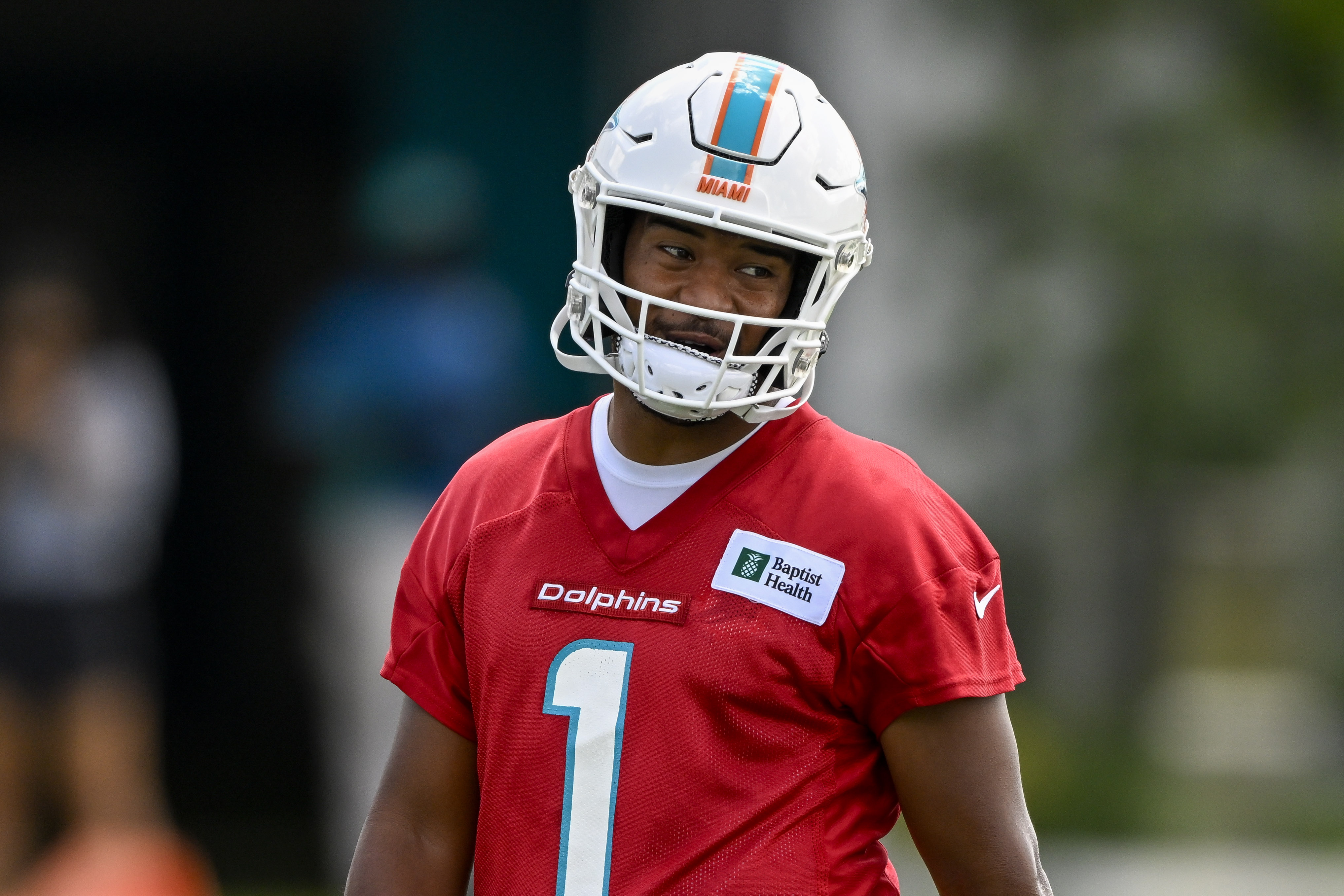 Tua Tagovailoa opens Dolphins mandatory minicamp in lauded orange jersey