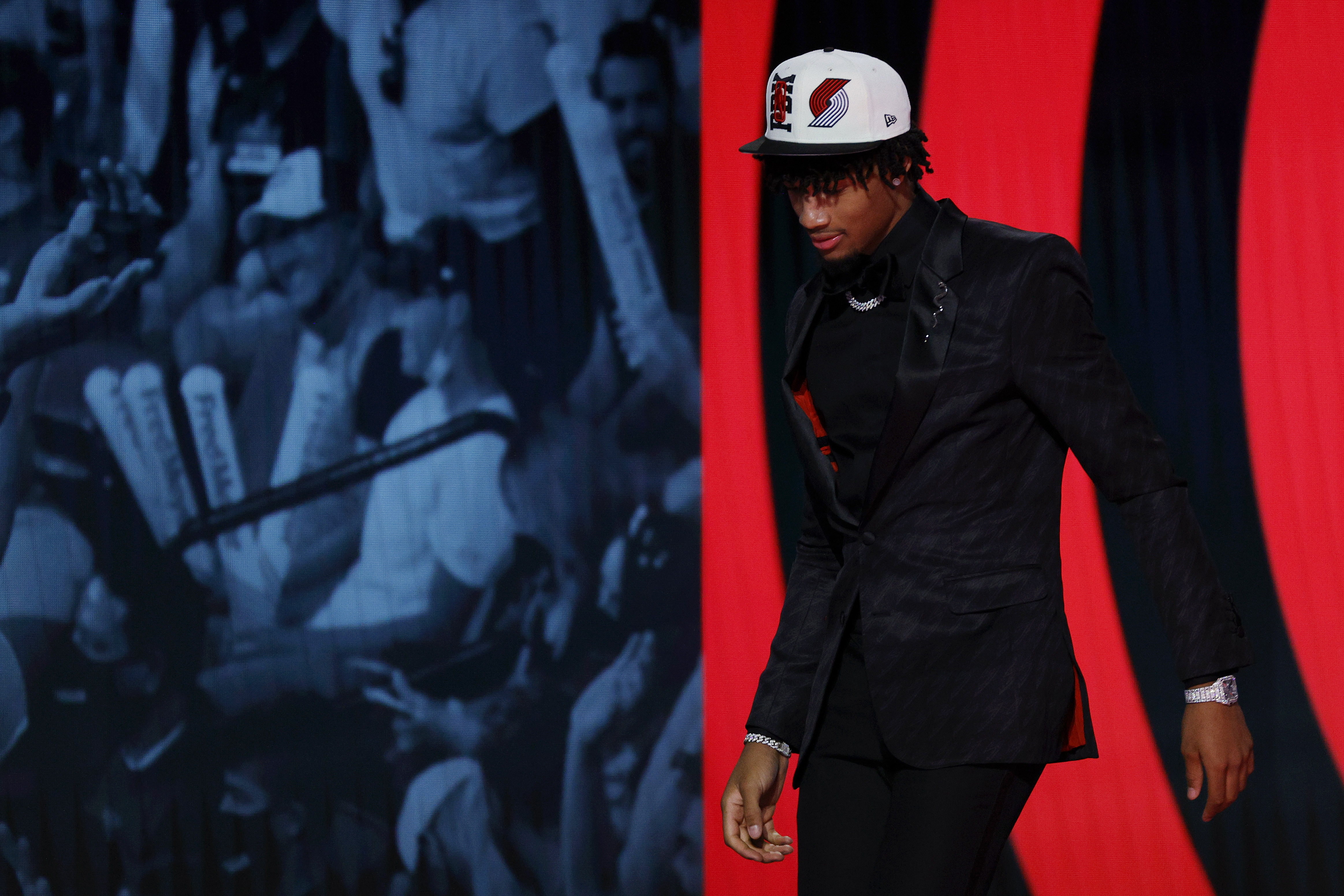 NEW YORK, NEW YORK - JUNE 23: Shaedon Sharpe looks on after being drafted with the 7th overall pick by the Portland Trail Blazers during the 2022 NBA Draft at Barclays Center on June 23, 2022 in New York City. NOTE TO USER: User expressly acknowledges and agrees that, by downloading and or using this photograph, User is consenting to the terms and conditions of the Getty Images License Agreement. (Photo by Sarah Stier/Getty Images) NEW YORK, NEW YORK - JUNE 23: Shaedon Sharpe looks on after being drafted with the 7th overall pick by the Portland Trail Blazers during the 2022 NBA Draft at Barclays Center on June 23, 2022 in New York City. NOTE TO USER: User expressly acknowledges and agrees that, by downloading and or using this photograph, User is consenting to the terms and conditions of the Getty Images License Agreement. (Photo by Sarah Stier/Getty Images)
