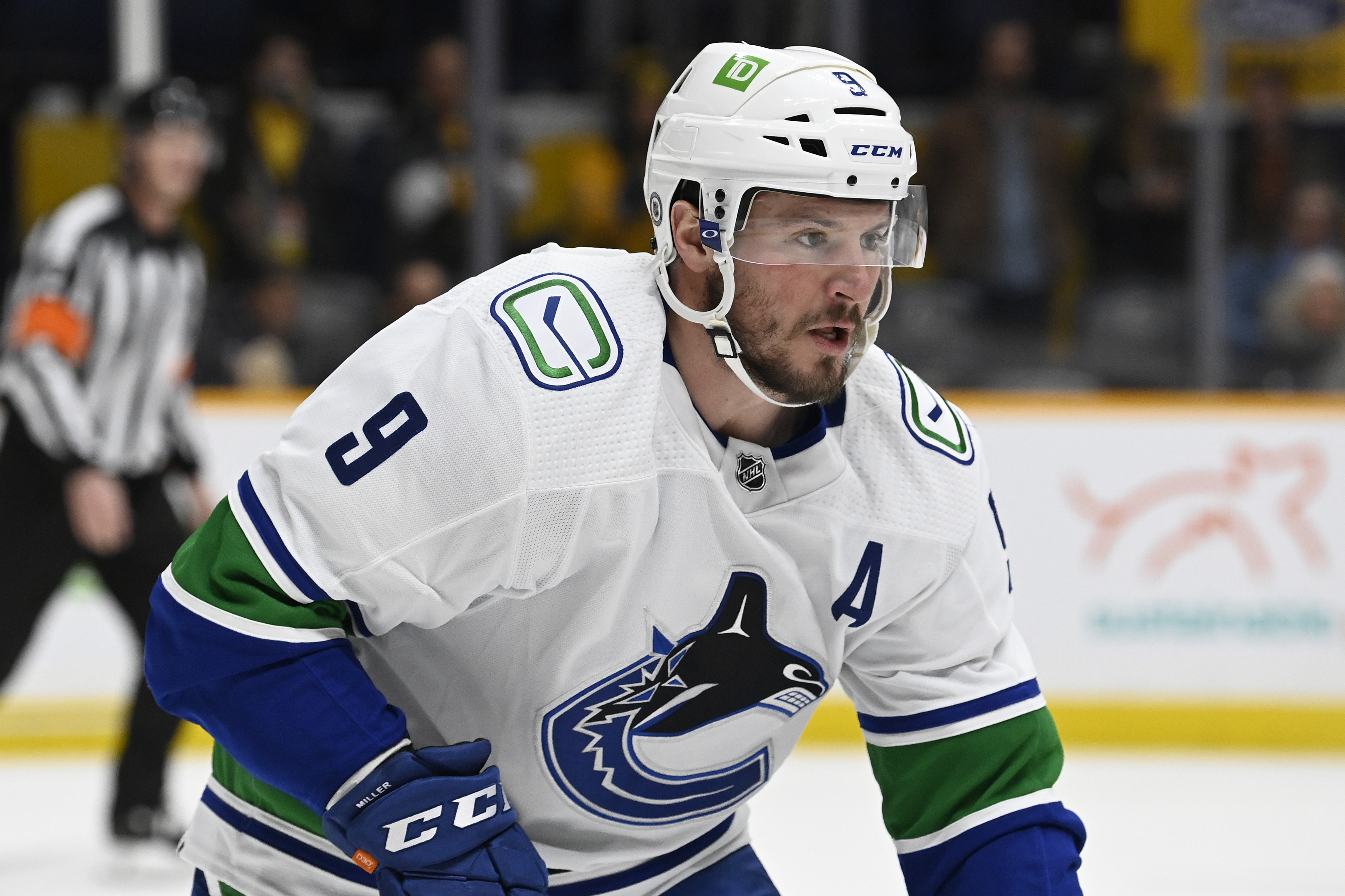 Vancouver Canucks center J.T. Miller (9) plays against the Nashville Predators during the first period of an NHL hockey game Tuesday, Feb. 1, 2022, in Nashville, Tenn. (AP Photo/Mark Zaleski)