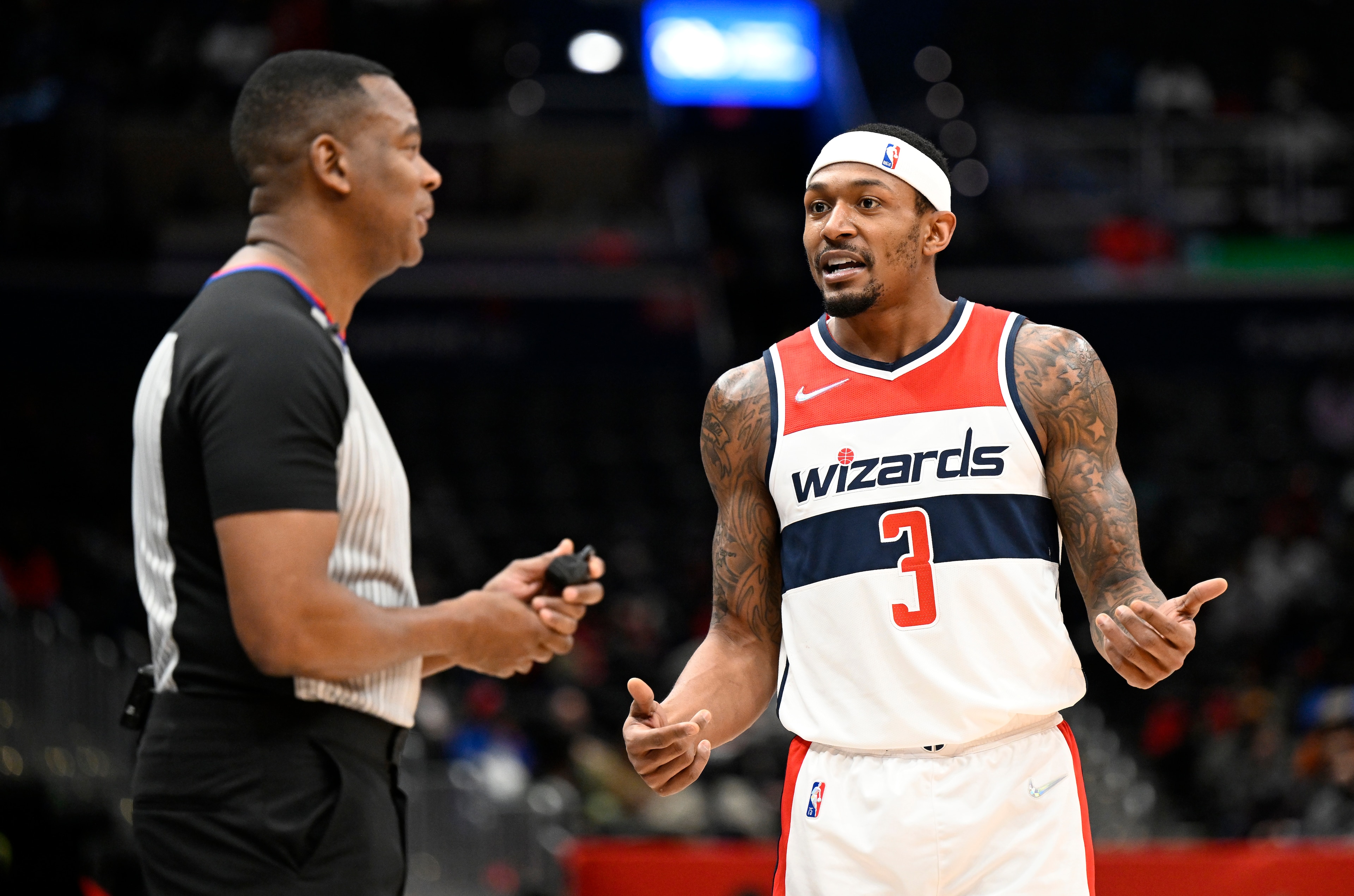 WASHINGTON, DC - JANUARY 25: Bradley Beal #3 of the Washington Wizards talks with official Sean Wright #4 during the game against the LA Clippers at Capital One Arena on January 25, 2022 in Washington, DC. NOTE TO USER: User expressly acknowledges and agrees that, by downloading and or using this photograph, User is consenting to the terms and conditions of the Getty Images License Agreement. (Photo by G Fiume/Getty Images) WASHINGTON, DC - JANUARY 25: Bradley Beal #3 of the Washington Wizards talks with official Sean Wright #4 during the game against the LA Clippers at Capital One Arena on January 25, 2022 in Washington, DC. NOTE TO USER: User expressly acknowledges and agrees that, by downloading and or using this photograph, User is consenting to the terms and conditions of the Getty Images License Agreement. (Photo by G Fiume/Getty Images)