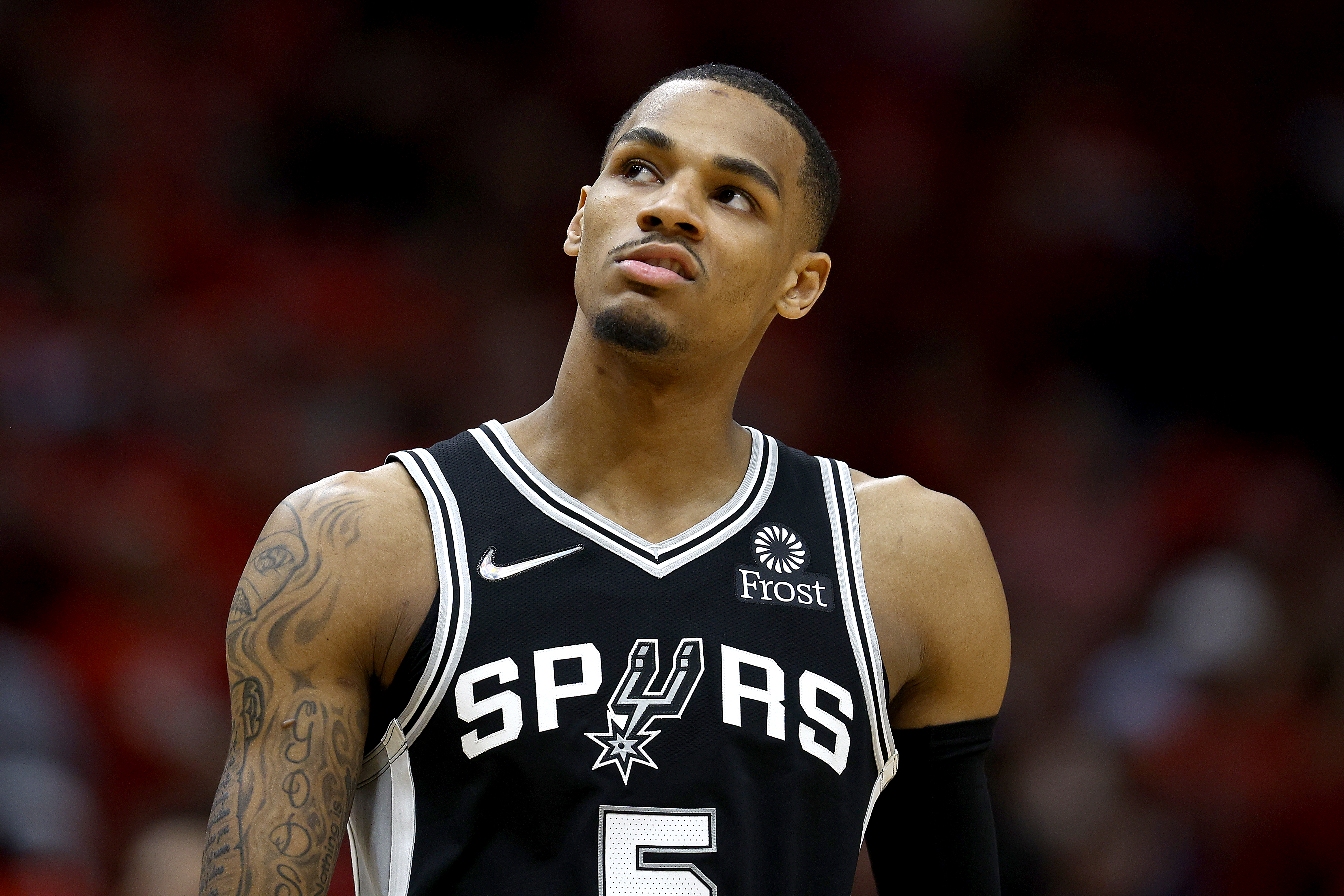 NEW ORLEANS, LOUISIANA - APRIL 13: Dejounte Murray #5 of the San Antonio Spurs stands on the court during the first quarter of the 2022 NBA Play-In Tournament at Smoothie King Center on April 13, 2022 in New Orleans, Louisiana. NOTE TO USER: User expressly acknowledges and agrees that, by downloading and or using this photograph, User is consenting to the terms and conditions of the Getty Images License Agreement. (Photo by Sean Gardner/Getty Images)