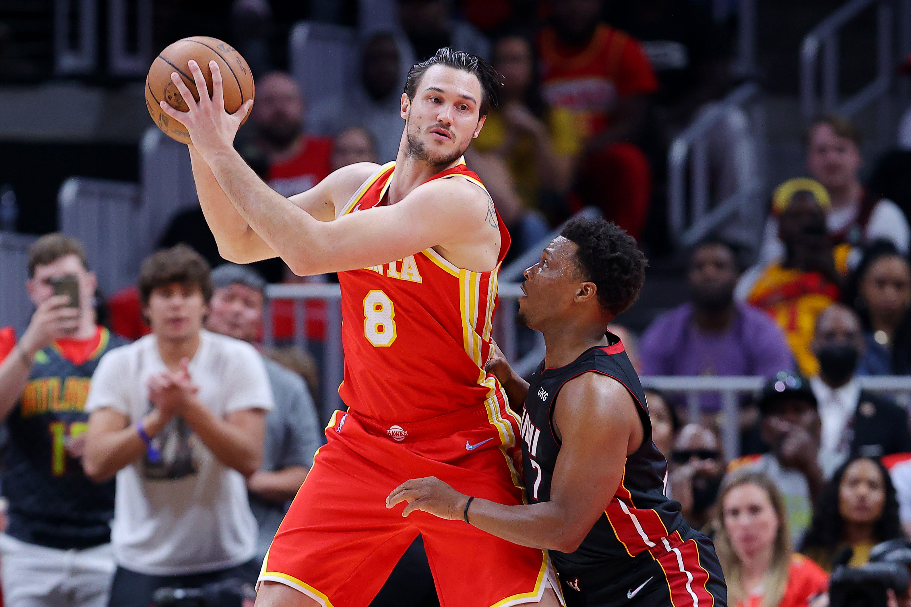 ATLANTA, GEORGIA - APRIL 22: Danilo Gallinari #8 of the Atlanta Hawks drives to the basket against Kyle Lowry #7 of the Miami Heat during the second quarter in Game Three of the Eastern Conference First Round at State Farm Arena on April 22, 2022 in Atlanta, Georgia. NOTE TO USER: User expressly acknowledges and agrees that, by downloading and or using this photograph, User is consenting to the terms and conditions of the Getty Images License Agreement. (Photo by Kevin C. Cox/Getty Images)