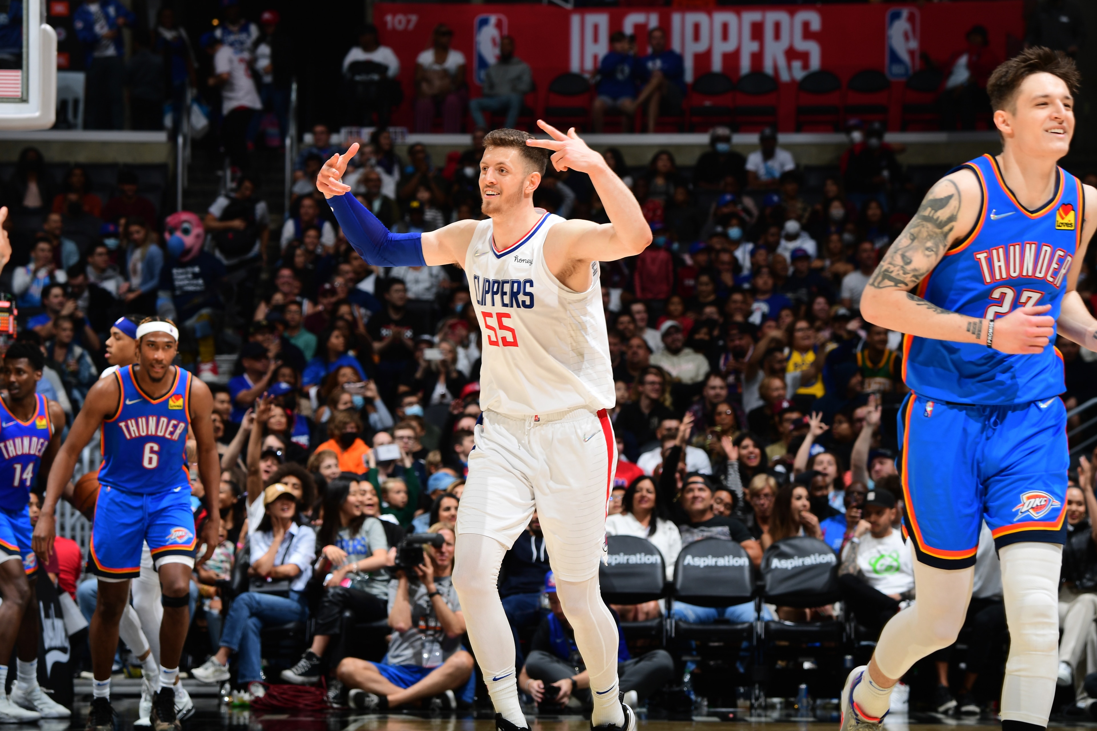 LOS ANGELES, CA - APRIl 10: Isaiah Hartenstein #55 of the LA Clippers celebrates during the game against the Oklahoma City Thunder on April 10, 2022 at Crypto.Com Arena in Los Angeles, California. NOTE TO USER: User expressly acknowledges and agrees that, by downloading and/or using this Photograph, user is consenting to the terms and conditions of the Getty Images License Agreement. Mandatory Copyright Notice: Copyright 2022 NBAE (Photo by Adam Pantozzi/NBAE via Getty Images) LOS ANGELES, CA - APRIl 10: Isaiah Hartenstein #55 of the LA Clippers celebrates during the game against the Oklahoma City Thunder on April 10, 2022 at Crypto.Com Arena in Los Angeles, California. NOTE TO USER: User expressly acknowledges and agrees that, by downloading and/or using this Photograph, user is consenting to the terms and conditions of the Getty Images License Agreement. Mandatory Copyright Notice: Copyright 2022 NBAE (Photo by Adam Pantozzi/NBAE via Getty Images)