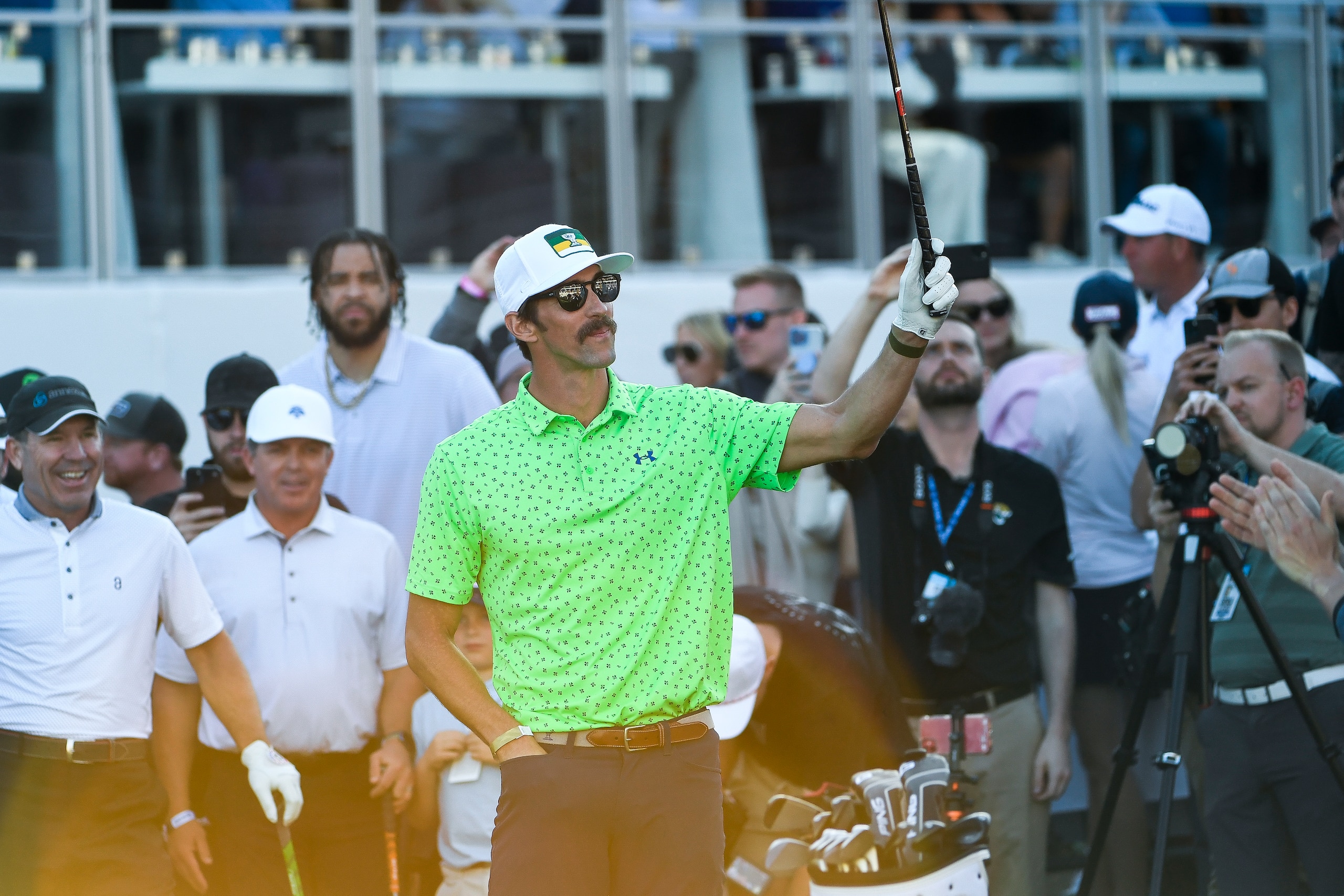SCOTTSDALE, AZ - FEBRUARY 09:  Olympian Michael Phelps during the Whoop Shot at Glory at the 16th hole prior to the WM Phoenix Open at TPC Scottsdale on February 9, 2022 in Scottsdale, Arizona. (Photo by Tracy Wilcox/PGA TOUR via Getty Images)