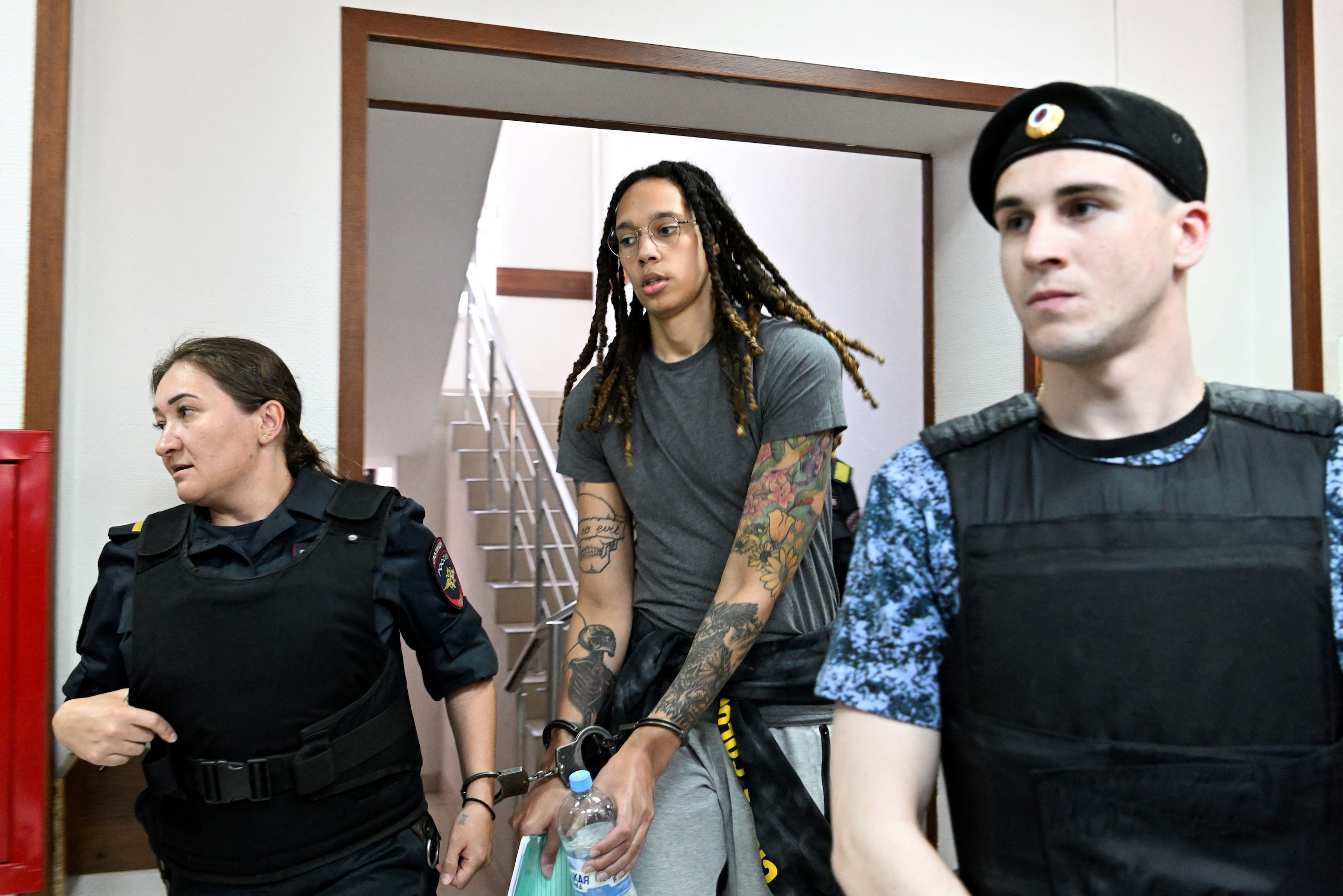 TOPSHOT - US WNBA basketball superstar Brittney Griner arrives to a hearing at the Khimki Court, outside Moscow on June 27, 2022. - Griner, a two-time Olympic gold medallist and WNBA champion, was detained at Moscow airport in February on charges of carrying in her luggage vape cartridges with cannabis oil, which could carry a 10-year prison sentence. (Photo by Kirill KUDRYAVTSEV / AFP) (Photo by KIRILL KUDRYAVTSEV/AFP via Getty Images)