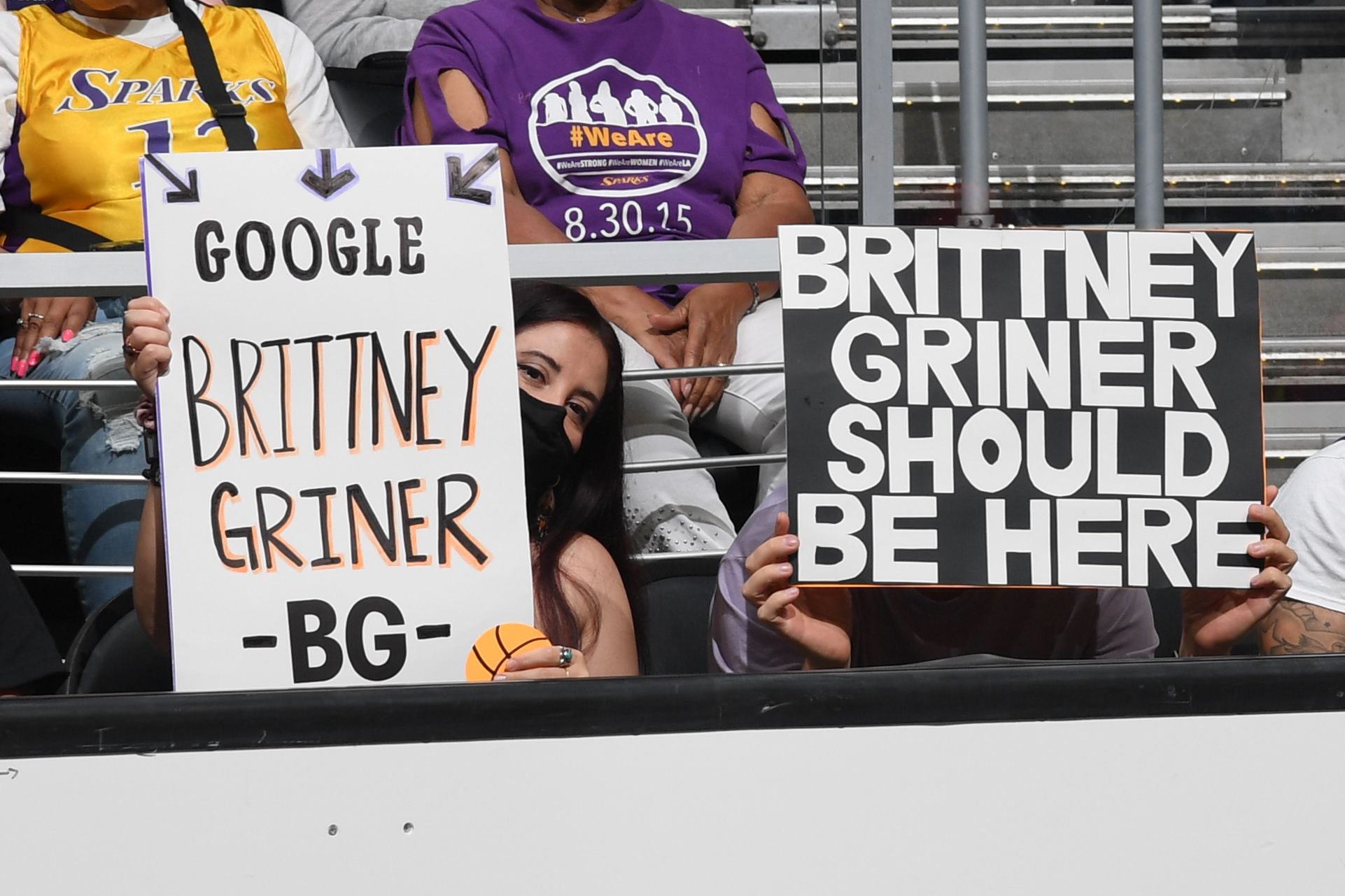 LOS ANGELES, CA - July 4: Fans hold signs supporting Brittney Griner #42 of the Phoenix Mercury during the game against the Los Angeles Sparks on July 4, 2022 at Crypto.com Arena in Los Angeles, California. NOTE TO USER: User expressly acknowledges and agrees that, by downloading and/or using this Photograph, user is consenting to the terms and conditions of the Getty Images License Agreement. Mandatory Copyright Notice: Copyright 2022 NBAE (Photo by Juan Ocampo/NBAE via Getty Images)
