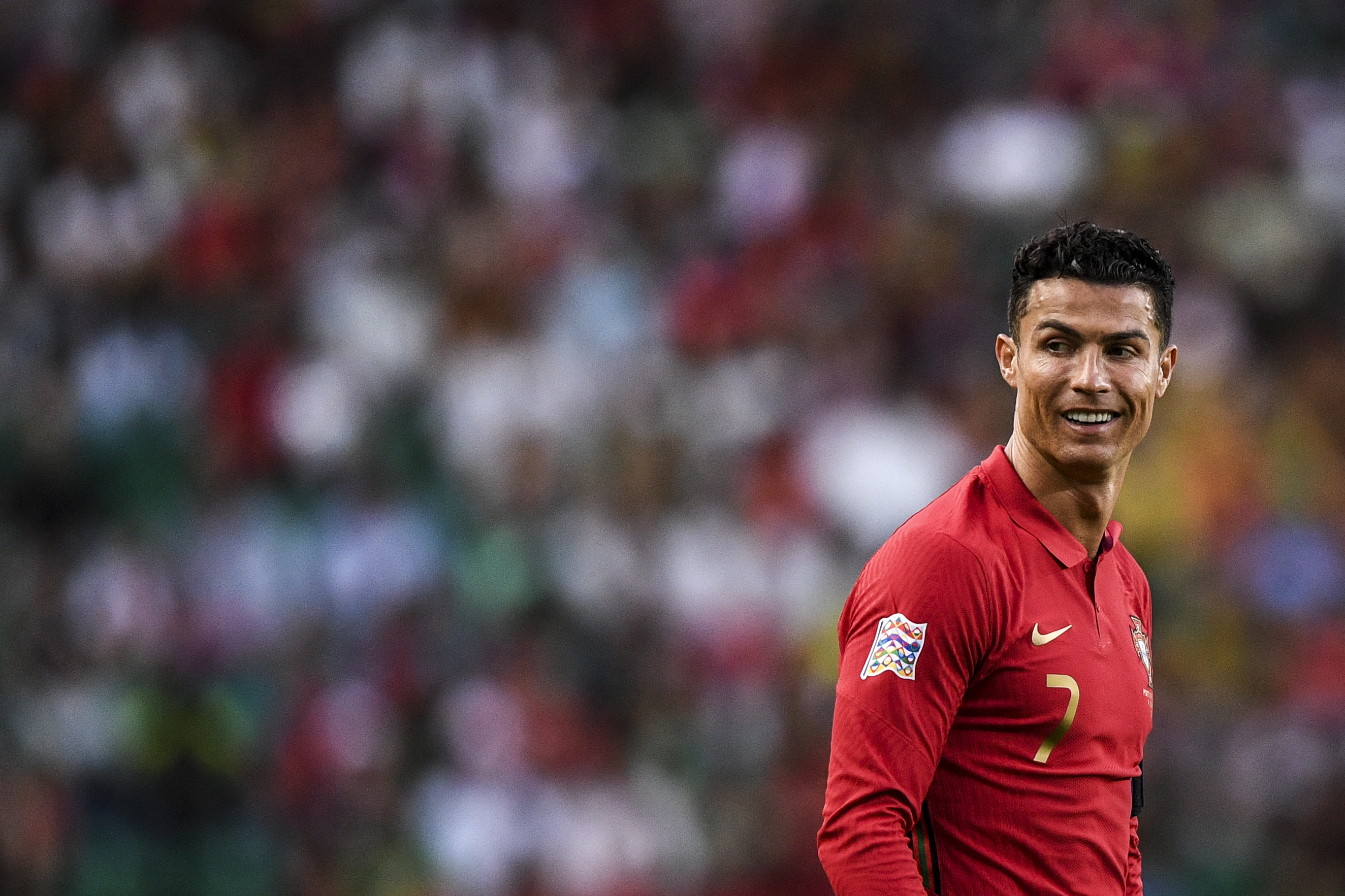 Portugal's forward Cristiano Ronaldo smiles during the UEFA Nations League, league A group 2 football match between Portugal and Czech Republic at the Jose Alvalade stadium in Lisbon on June 9, 2022. (Photo by PATRICIA DE MELO MOREIRA / AFP) (Photo by PATRICIA DE MELO MOREIRA/AFP via Getty Images)