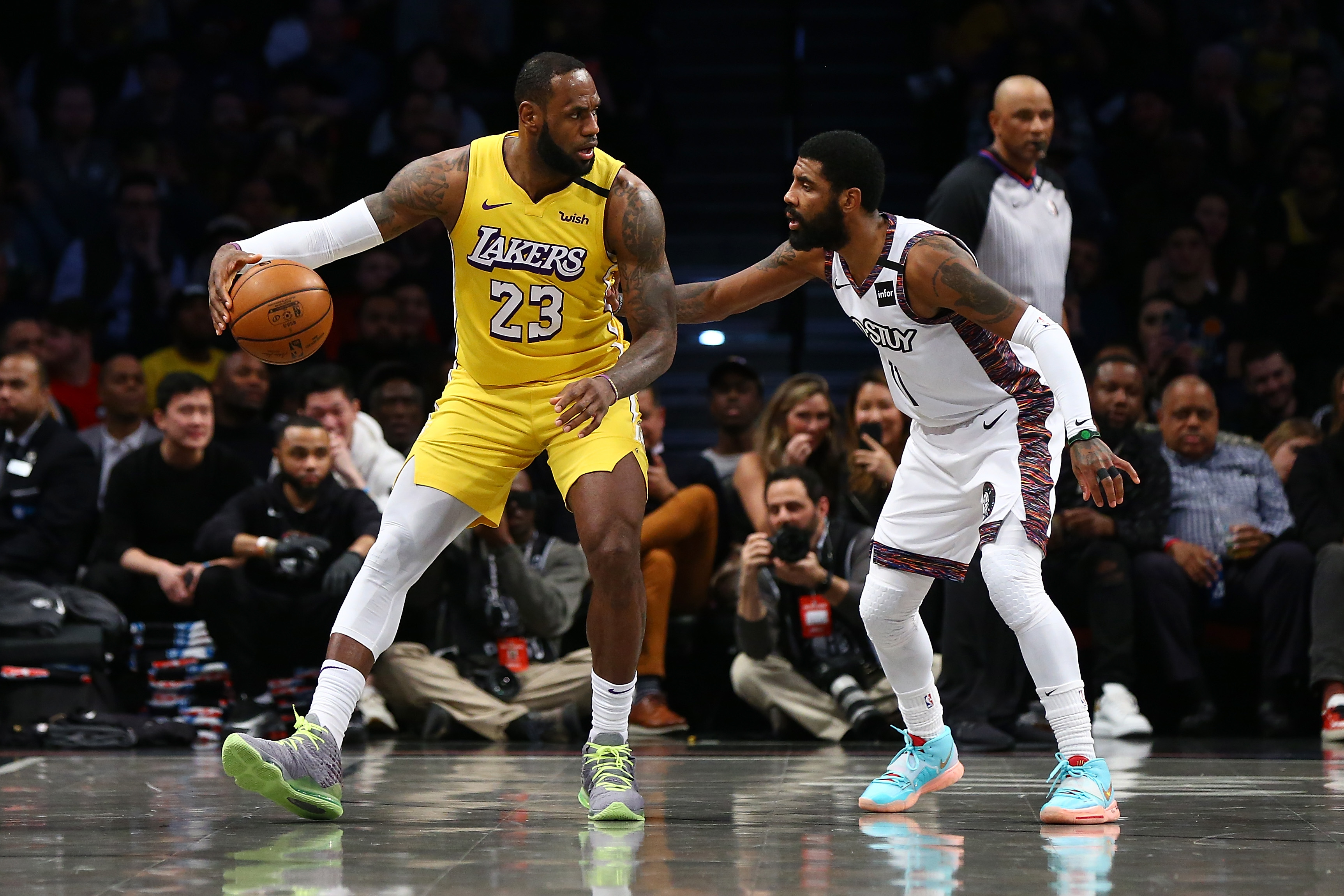 NEW YORK, NEW YORK - JANUARY 23: LeBron James #23 of the Los Angeles Lakers posts up against Kyrie Irving #11 of the Brooklyn Nets at Barclays Center on January 23, 2020 in New York City. NOTE TO USER: User expressly acknowledges and agrees that, by downloading and or using this photograph, User is consenting to the terms and conditions of the Getty Images License Agreement. (Photo by Mike Stobe/Getty Images) NEW YORK, NEW YORK - JANUARY 23: LeBron James #23 of the Los Angeles Lakers posts up against Kyrie Irving #11 of the Brooklyn Nets at Barclays Center on January 23, 2020 in New York City. NOTE TO USER: User expressly acknowledges and agrees that, by downloading and or using this photograph, User is consenting to the terms and conditions of the Getty Images License Agreement. (Photo by Mike Stobe/Getty Images)