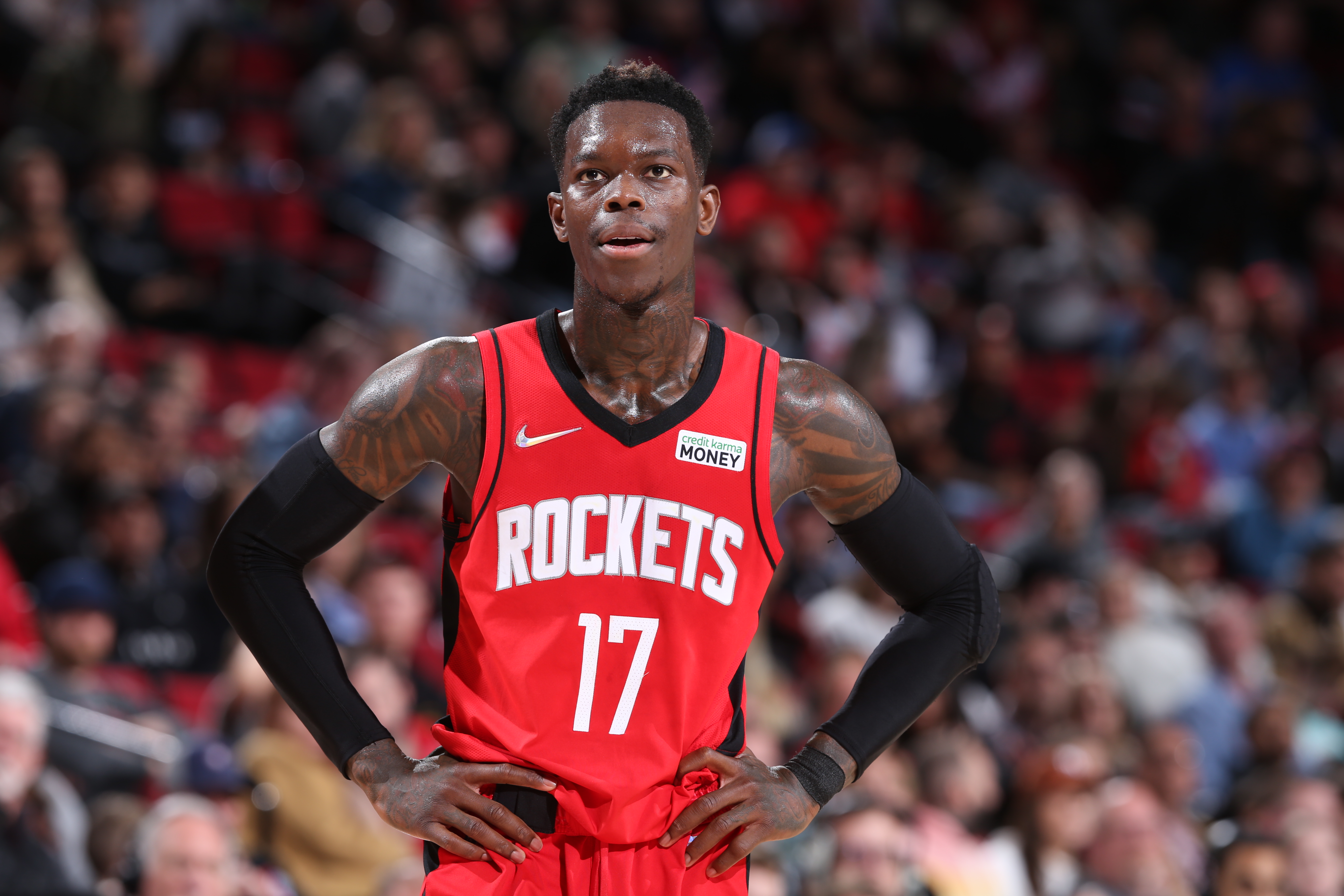 PORTLAND, OR - MARCH 26: Dennis Schroder #17 of the Houston Rockets looks on during the game against the Portland Trail Blazers on March 26, 2022 at the Moda Center Arena in Portland, Oregon. NOTE TO USER: User expressly acknowledges and agrees that, by downloading and or using this photograph, user is consenting to the terms and conditions of the Getty Images License Agreement. Mandatory Copyright Notice: Copyright 2022 NBAE (Photo by Sam Forencich/NBAE via Getty Images) PORTLAND, OR - MARCH 26: Dennis Schroder #17 of the Houston Rockets looks on during the game against the Portland Trail Blazers on March 26, 2022 at the Moda Center Arena in Portland, Oregon. NOTE TO USER: User expressly acknowledges and agrees that, by downloading and or using this photograph, user is consenting to the terms and conditions of the Getty Images License Agreement. Mandatory Copyright Notice: Copyright 2022 NBAE (Photo by Sam Forencich/NBAE via Getty Images)