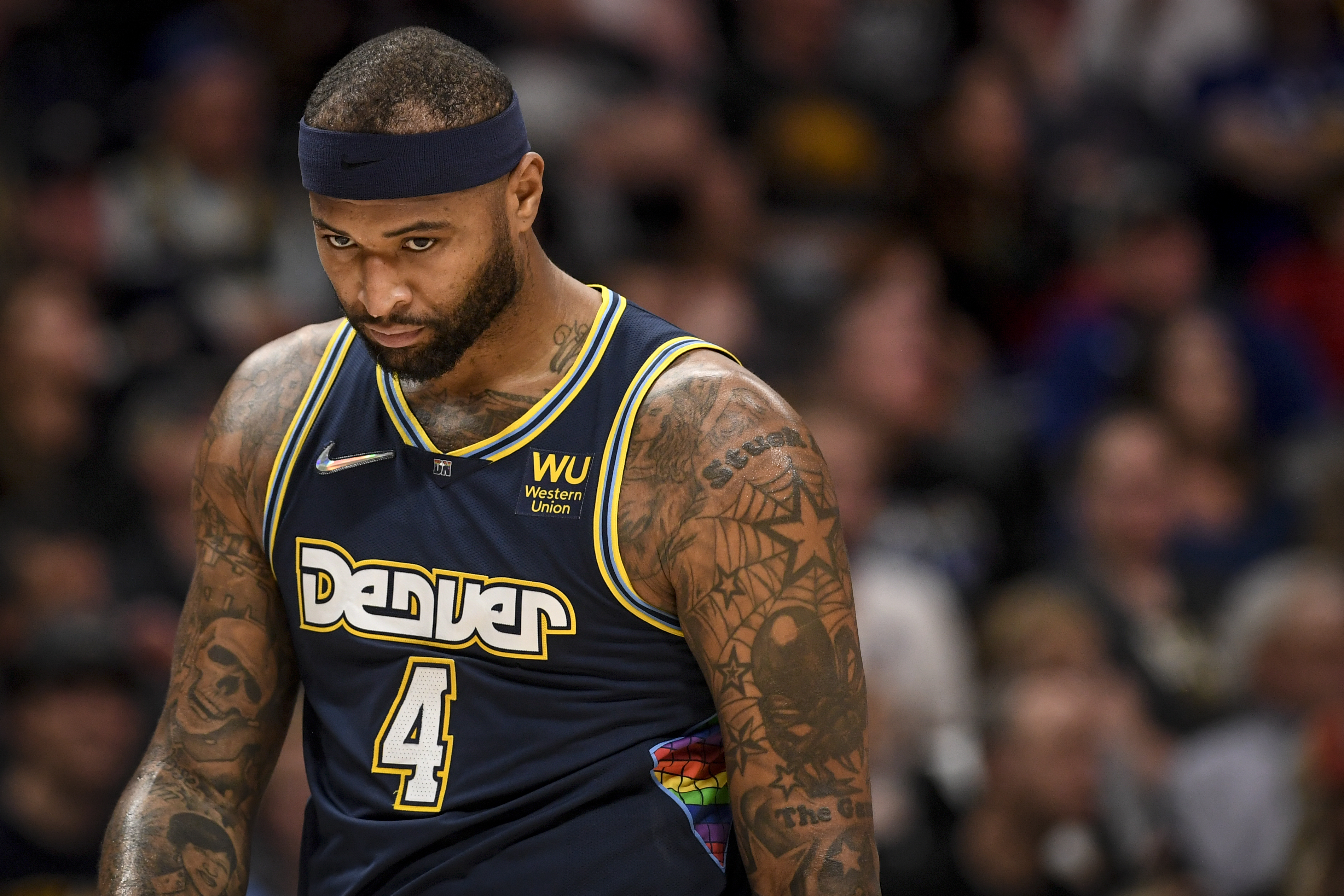 DENVER, CO - APRIL 24: DeMarcus Cousins (4) of the Denver Nuggets reacts to being called for fouling Andrew Wiggins (22) of the Golden State Warriors during the second quarter at Ball Arena on Sunday, April 24, 2022. (Photo by AAron Ontiveroz/MediaNews Group/The Denver Post via Getty Images) DENVER, CO - APRIL 24: DeMarcus Cousins (4) of the Denver Nuggets reacts to being called for fouling Andrew Wiggins (22) of the Golden State Warriors during the second quarter at Ball Arena on Sunday, April 24, 2022. (Photo by AAron Ontiveroz/MediaNews Group/The Denver Post via Getty Images)