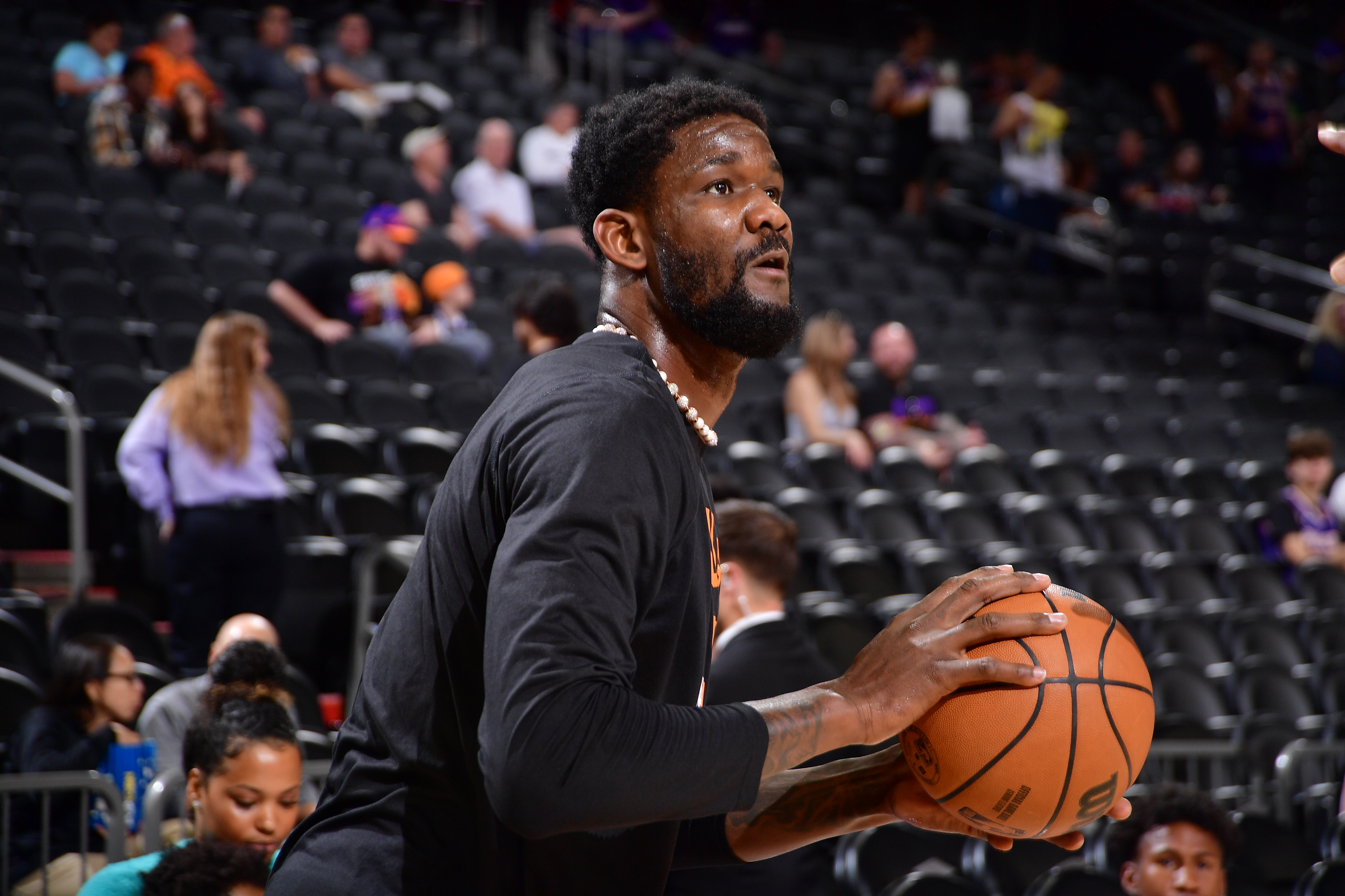 PHOENIX, AZ - MAY 10: Deandre Ayton #22 of the Phoenix Suns warms up before the game against the Dallas Mavericks during Game 5 of the 2022 NBA Playoffs Western Conference Semifinals on May 10, 2022 at Footprint Center in Phoenix, Arizona. NOTE TO USER: User expressly acknowledges and agrees that, by downloading and or using this photograph, user is consenting to the terms and conditions of the Getty Images License Agreement. Mandatory Copyright Notice: Copyright 2022 NBAE (Photo by Michael Gonzales/NBAE via Getty Images) PHOENIX, AZ - MAY 10: Deandre Ayton #22 of the Phoenix Suns warms up before the game against the Dallas Mavericks during Game 5 of the 2022 NBA Playoffs Western Conference Semifinals on May 10, 2022 at Footprint Center in Phoenix, Arizona. NOTE TO USER: User expressly acknowledges and agrees that, by downloading and or using this photograph, user is consenting to the terms and conditions of the Getty Images License Agreement. Mandatory Copyright Notice: Copyright 2022 NBAE (Photo by Michael Gonzales/NBAE via Getty Images)