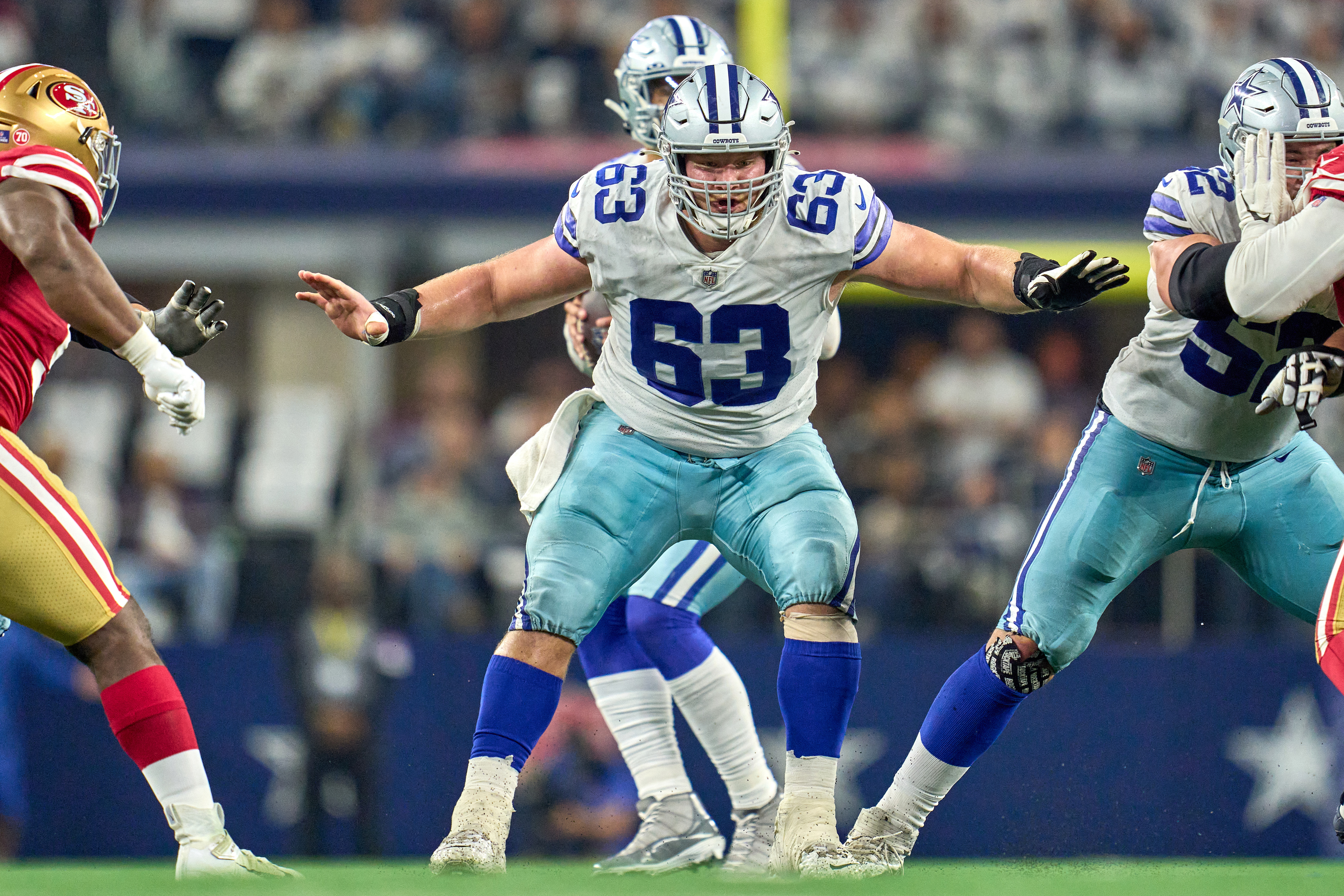 Dallas Cowboys offensive lineman Zack Martin (70) looks to block with Tyler  Biadasz (63) during an