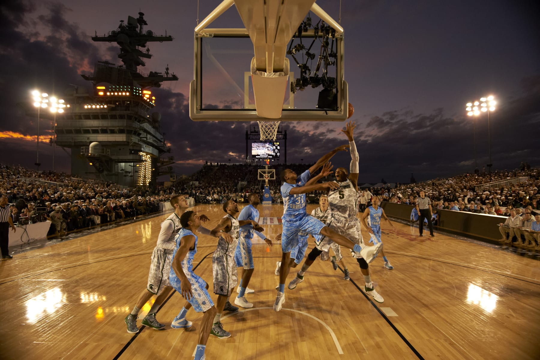 College Basketball: Quicken Loans Carrier Classic: Michigan State Adreian Payne (5) in action, shot vs North Carolina John Henson (31) aboard USS Carl Vinson (CVN-70) aircraft carrier docked in Naval Air Station North Island. Veterans Day. 
San Diego, CA 11/11/2011
CREDIT: John W. McDonough (Photo by John W. McDonough /Sports Illustrated via Getty Images)
(Set Number: X86610 TK1 R2 F71 )