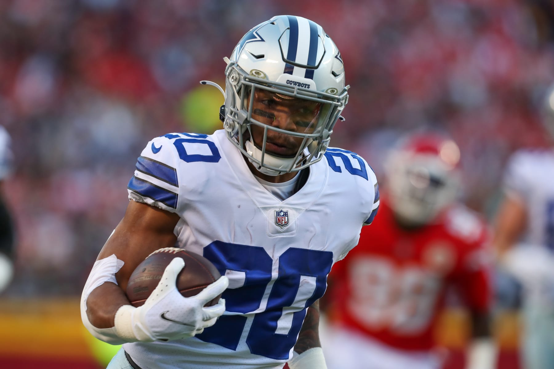 GREEN BAY, WI - NOVEMBER 13: Green Bay Packers safety Darnell Savage (26)  tackles Dallas Cowboys running back Tony Pollard (20) during a game between  the Green Bay Packers and the Dallas