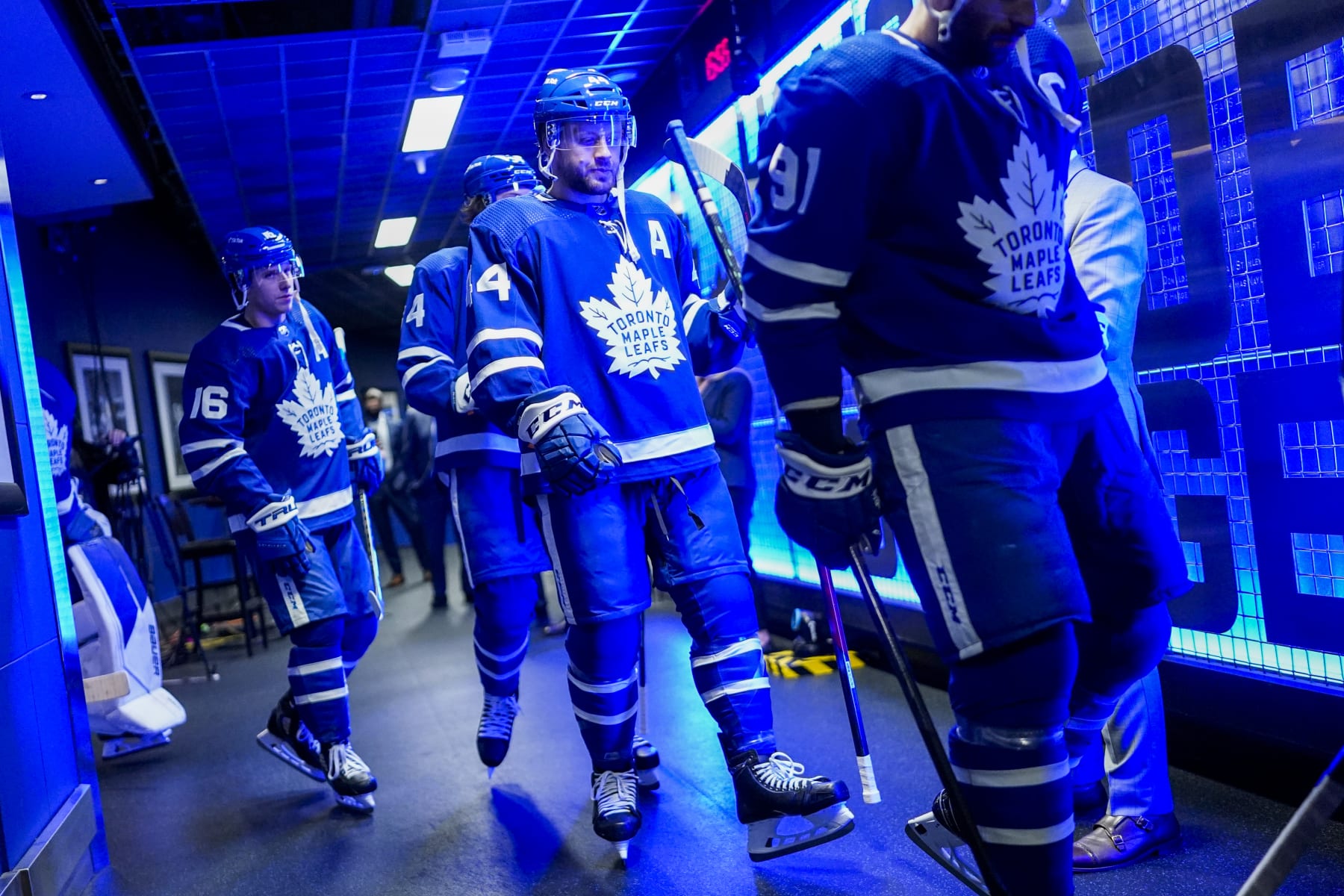 TORONTO, ON - MAY 14: Mitch Marner #16, Auston Matthews #34 and Morgan Rielly #44 of the Toronto Maple Leafs head to the ice before facing the Tampa Bay Lightning in Game Seven of the First Round of the 2022 Stanley Cup Playoffs at the Scotiabank Arena on May 14, 2022 in Toronto, Ontario, Canada. (Photo by Mark Blinch/NHLI via Getty Images)