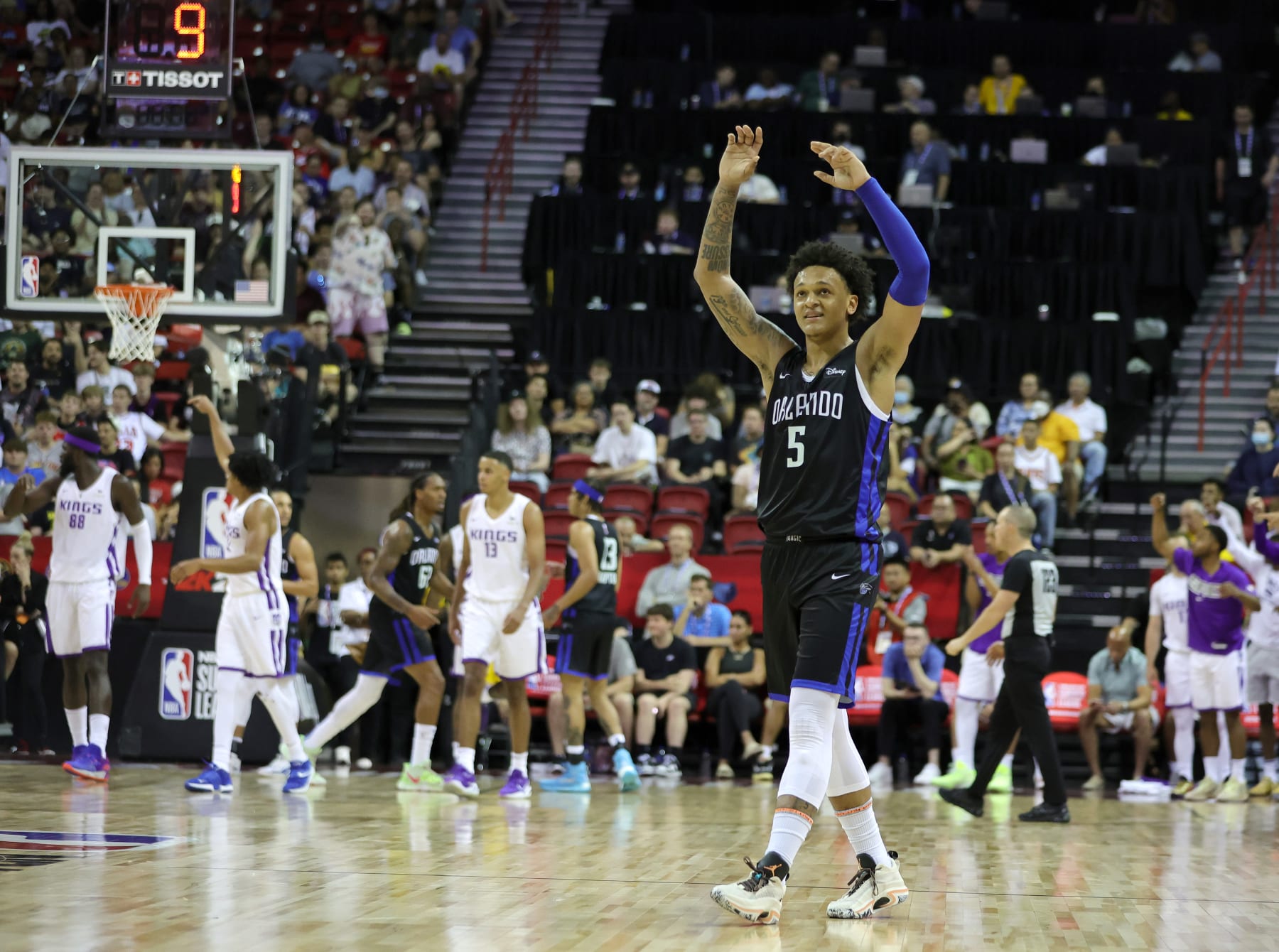 LAS VEGAS, NEVADA - JULY 09: Paolo Banchero #5 of the Orlando Magic reacts after a teammate was called for a foul against the Sacramento Kings during the 2022 NBA Summer League at the Thomas & Mack Center on July 09, 2022 in Las Vegas, Nevada. NOTE TO USER: User expressly acknowledges and agrees that, by downloading and or using this photograph, User is consenting to the terms and conditions of the Getty Images License Agreement. (Photo by Ethan Miller/Getty Images) LAS VEGAS, NEVADA - JULY 09: Paolo Banchero #5 of the Orlando Magic reacts after a teammate was called for a foul against the Sacramento Kings during the 2022 NBA Summer League at the Thomas & Mack Center on July 09, 2022 in Las Vegas, Nevada. NOTE TO USER: User expressly acknowledges and agrees that, by downloading and or using this photograph, User is consenting to the terms and conditions of the Getty Images License Agreement. (Photo by Ethan Miller/Getty Images)