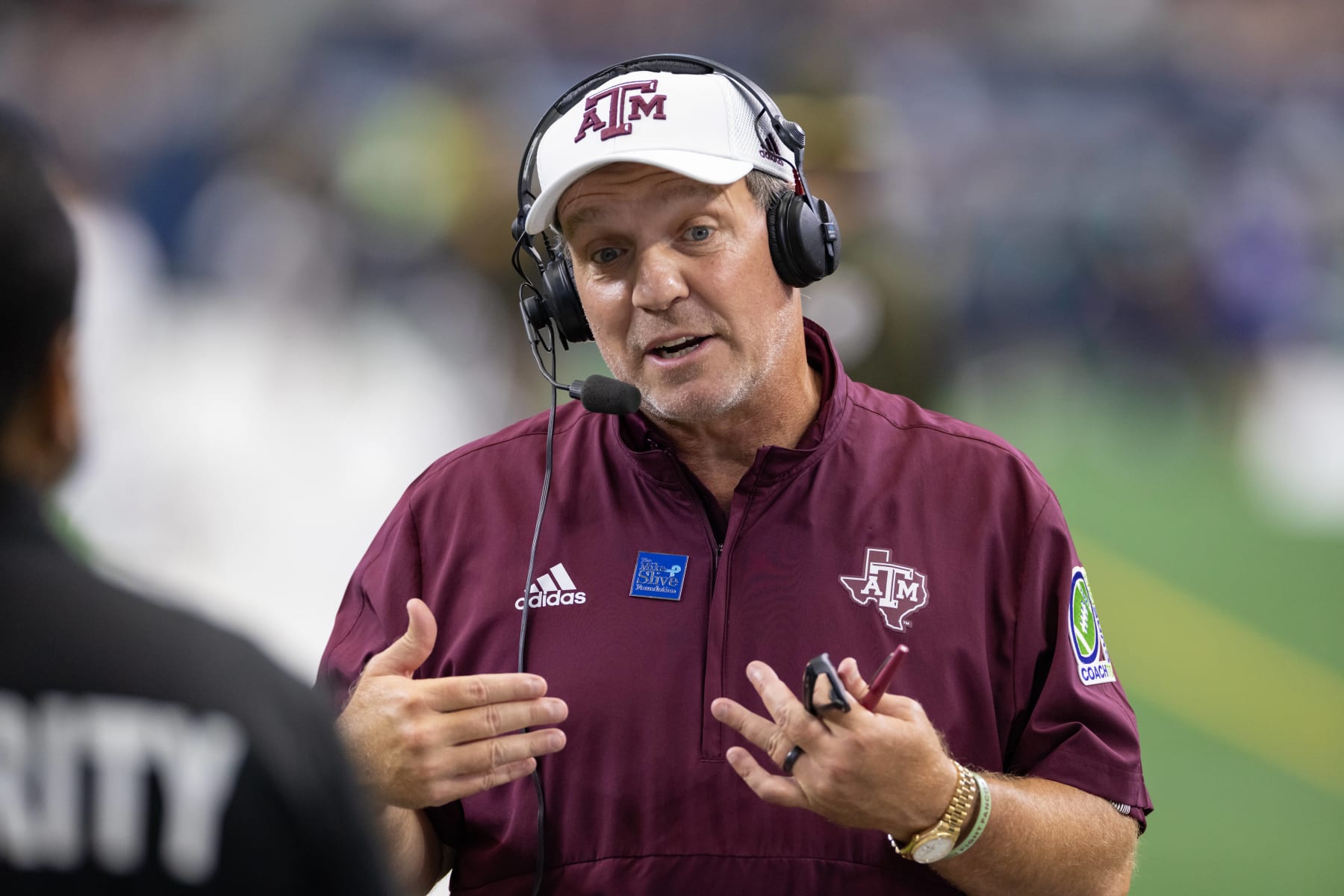 ARLINGTON, TX - SEPTEMBER 25: Texas A&M Aggies head coach Jimbo Fisher is interviewed on the field during the Southwest Classic college football game between the Texas A&M Aggies and Arkansas Razorbacks on September 25, 2021 at AT&T Stadium in Arlington, TX. (Photo by Matthew Visinsky/Icon Sportswire via Getty Images)