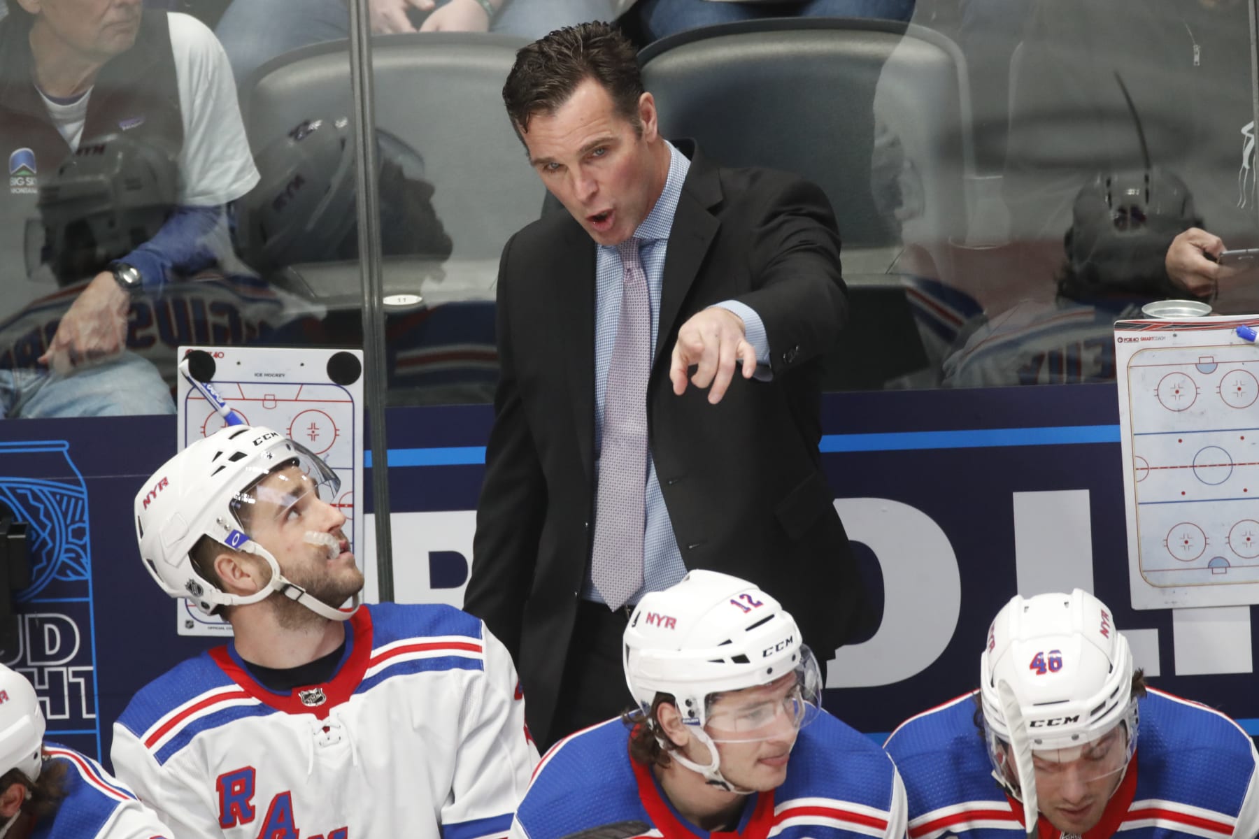New York Rangers head coach David Quinn in the first period of an NHL hockey game Wednesday, March 11, 2020, in Denver. (AP Photo/David Zalubowski)
