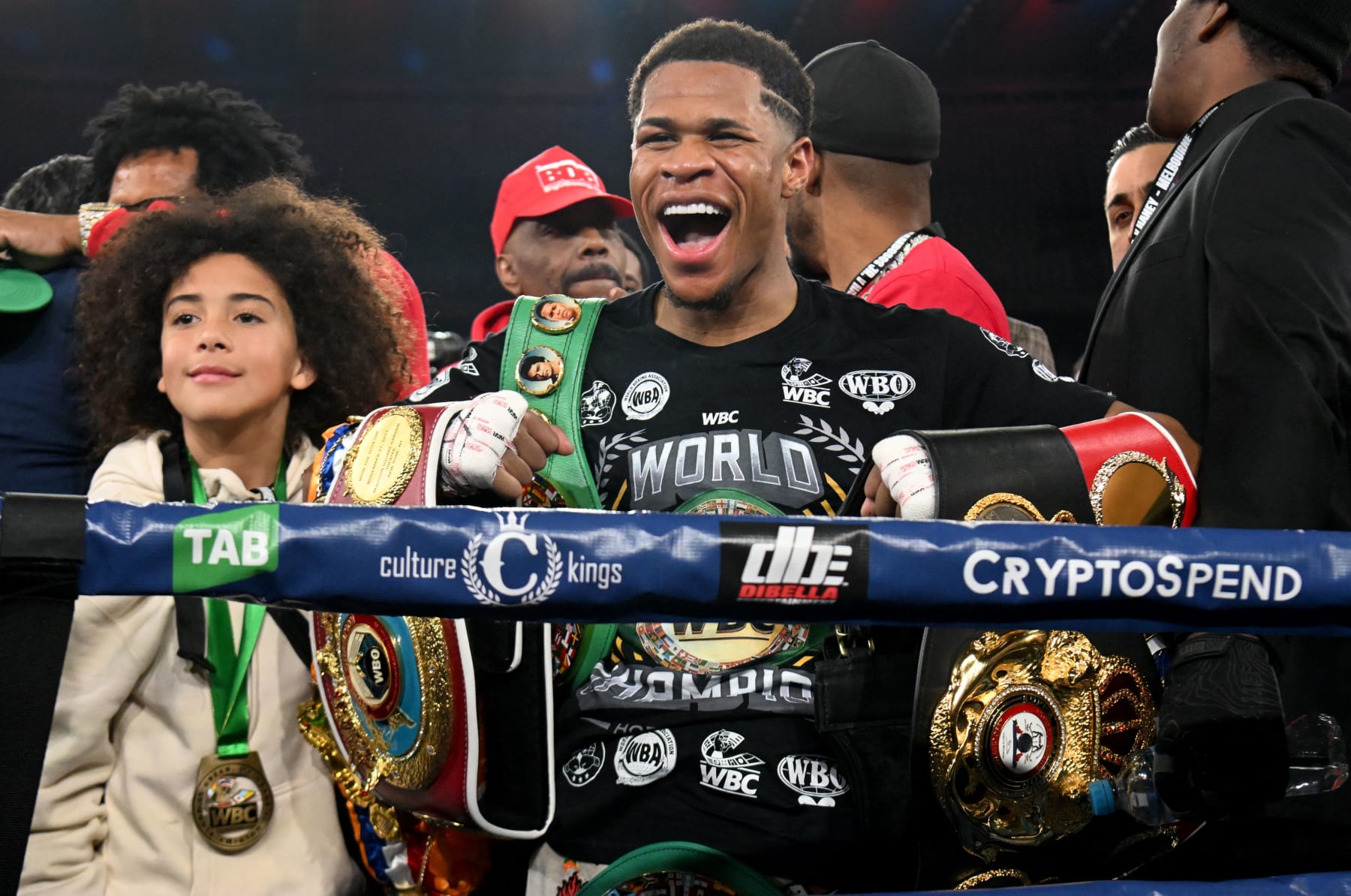 Devin Haney of the US celebrates after defeating Australia's George Kambosos in the lightweight unification title boxing bout to become the undisputed lightweight champion of the world in Melbourne on June 5, 2022. - -- IMAGE RESTRICTED TO EDITORIAL USE - STRICTLY NO COMMERCIAL USE -- (Photo by William WEST / AFP) / -- IMAGE RESTRICTED TO EDITORIAL USE - STRICTLY NO COMMERCIAL USE -- (Photo by WILLIAM WEST/AFP via Getty Images)