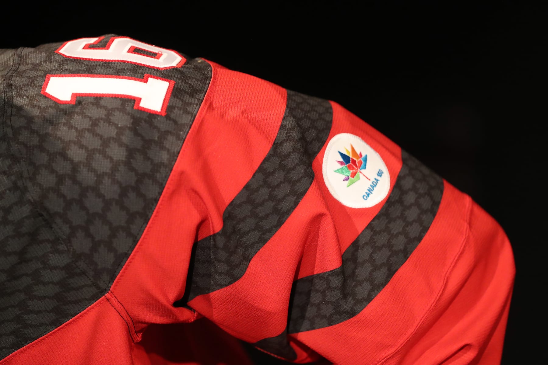 TORONTO, ON- AUGUST 2  -  Rows of Maple Leaf icons fill the jersey's shoulder caps.  The jersey also sports the Canada 150 logo. The Jersey is made with ripstop fabric to resist ripping. Nike unveils a new hockey jersey design for the National Team programs leading into the World Cup of Hockey in Toronto. August 2, 2016.        (Steve Russell/Toronto Star via Getty Images)