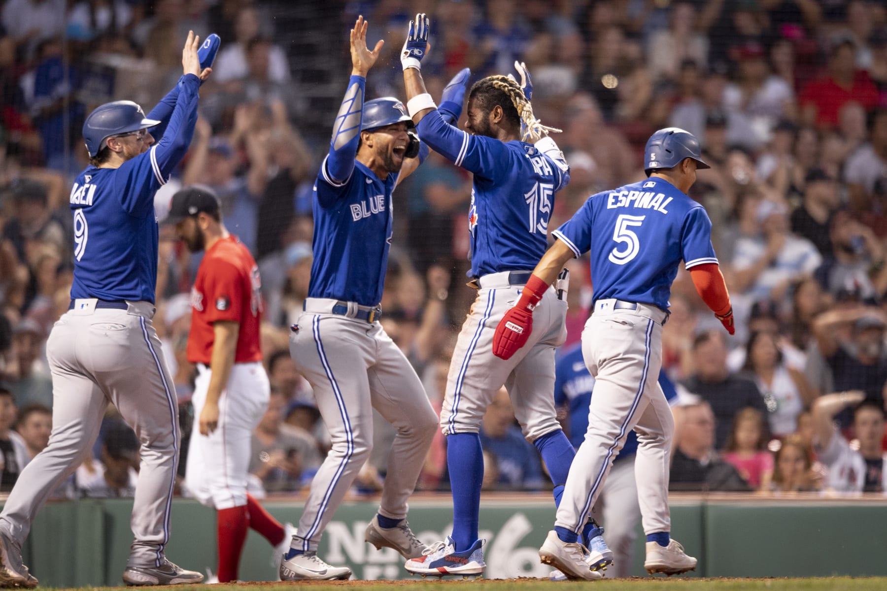 BOSTON, MA - JULY 22: Raimel Tapia #15 of the Toronto Blue Jays reacts after hitting an inside-the-park grand slam during the third inning of a game against the Boston Red Sox on July 22, 2022 at Fenway Park in Boston, Massachusetts. (Photo by Maddie Malhotra/Boston Red Sox/Getty Images)