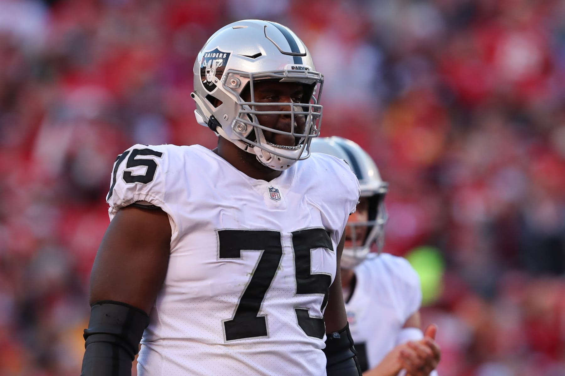 Oakland Raiders offensive tackle Brandon Parker (75) watches