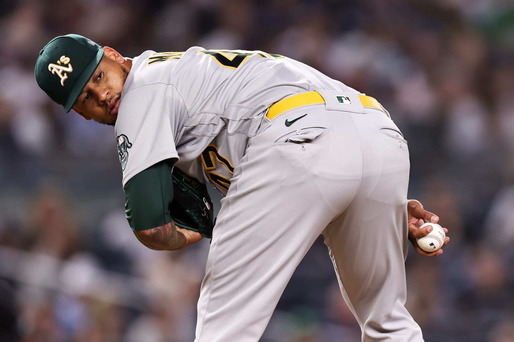 NEW YORK, NEW YORK - JUNE 28: Frankie Montas #47 of the Oakland Athletics looks at a baserunner at first base during the fifth inning of the game against the New York Yankees at Yankee Stadium on June 28, 2022 in New York City. (Photo by Dustin Satloff/Getty Images)