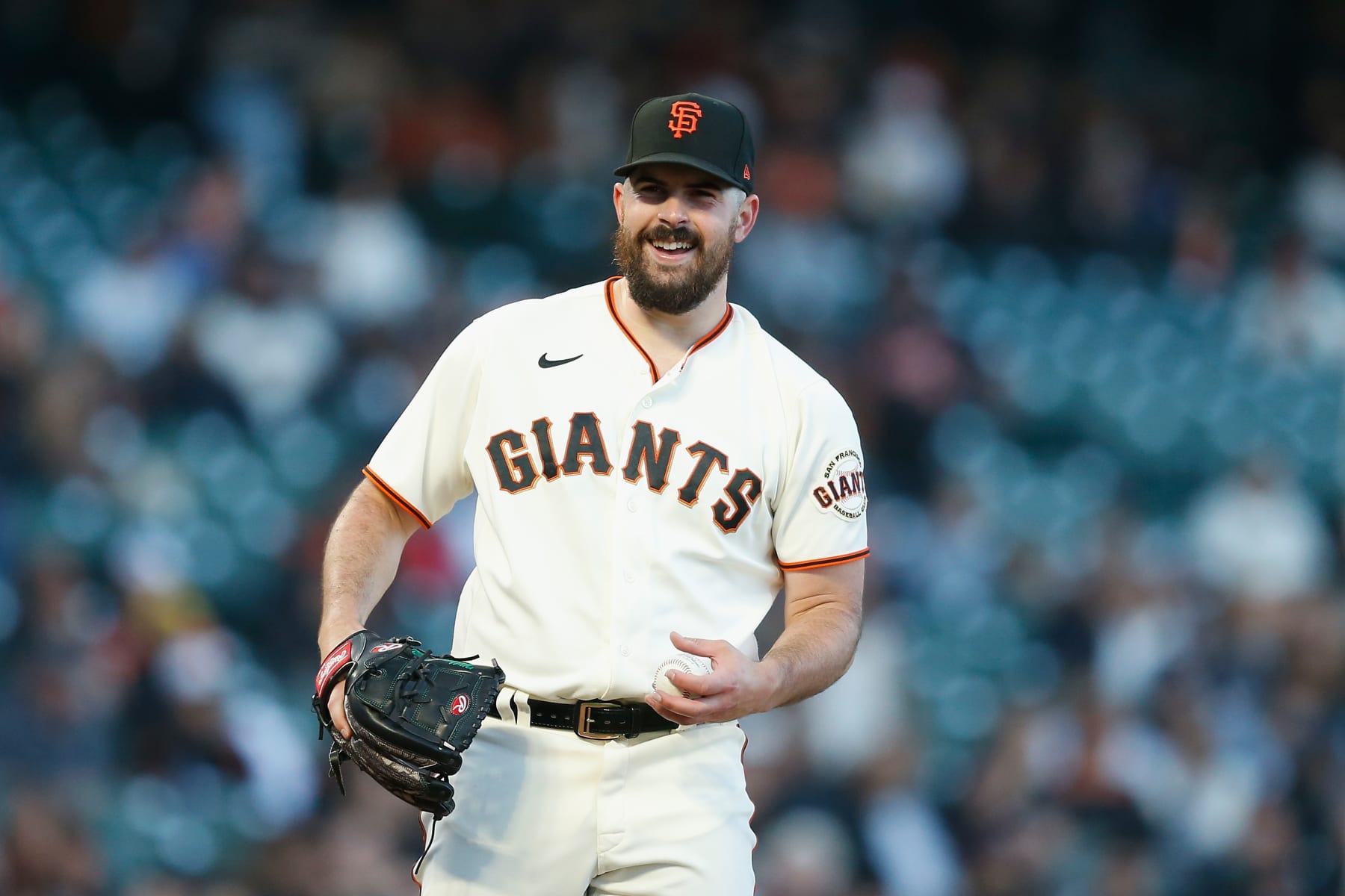 SAN FRANCISCO, CALIFORNIA - JULY 14: Pitcher Carlos Rodon #16 of the San Francisco Giants looks on during the game against the Milwaukee Brewers at Oracle Park on July 14, 2022 in San Francisco, California. (Photo by Lachlan Cunningham/Getty Images)