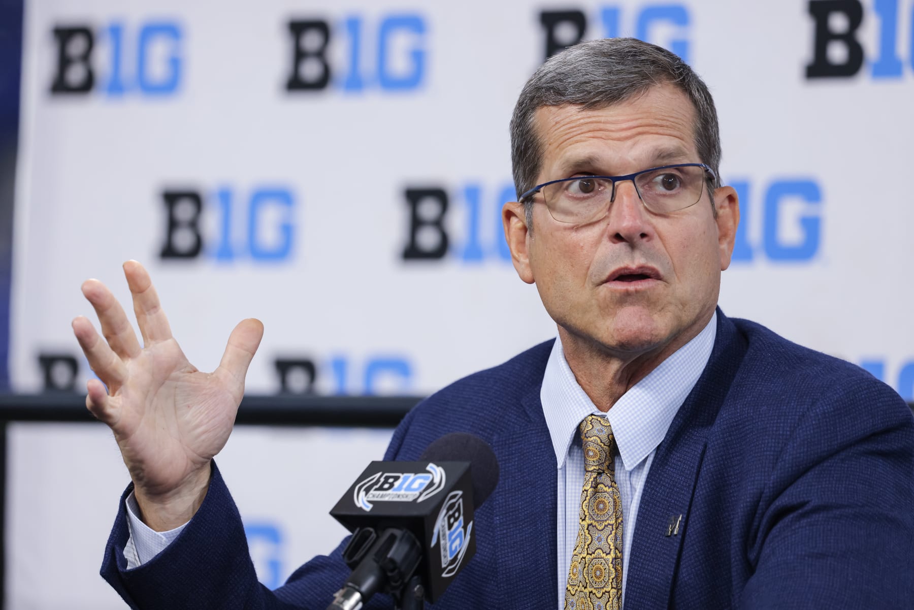 INDIANAPOLIS, IN - JULY 26: Head coach Jim Harbaugh of the Michigan Wolverines speaks during the 2022 Big Ten Conference Football Media Days at Lucas Oil Stadium on July 26, 2022 in Indianapolis, Indiana. (Photo by Michael Hickey/Getty Images)