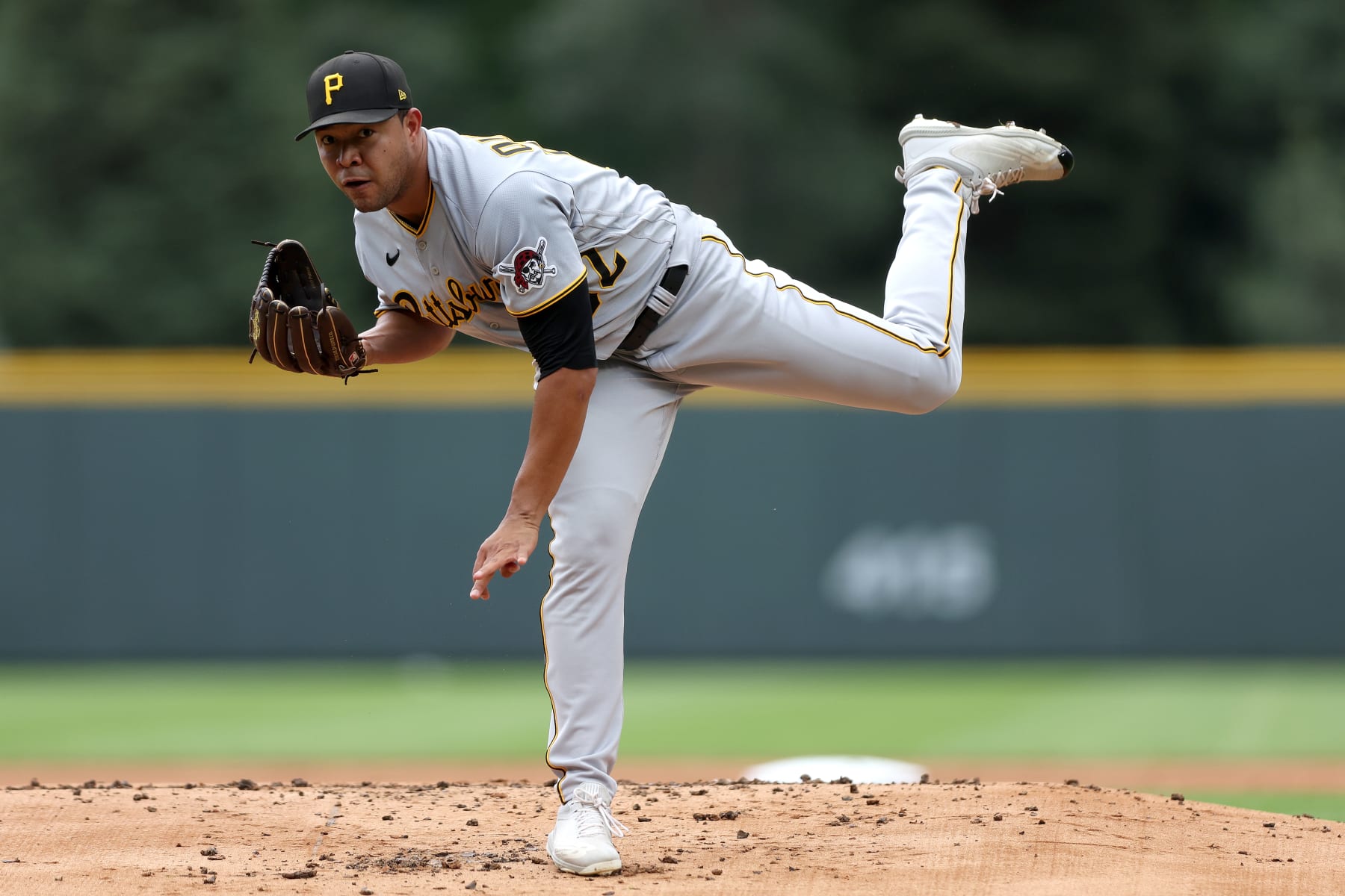 DENVER, COLORADO - JULY 15: Starting pitcher Jose Quintana #62 of the Pittsburgh Pirates throws against the Colorado Rockies in the first inning at Coors Field on July 15, 2022 in Denver, Colorado. (Photo by Matthew Stockman/Getty Images)