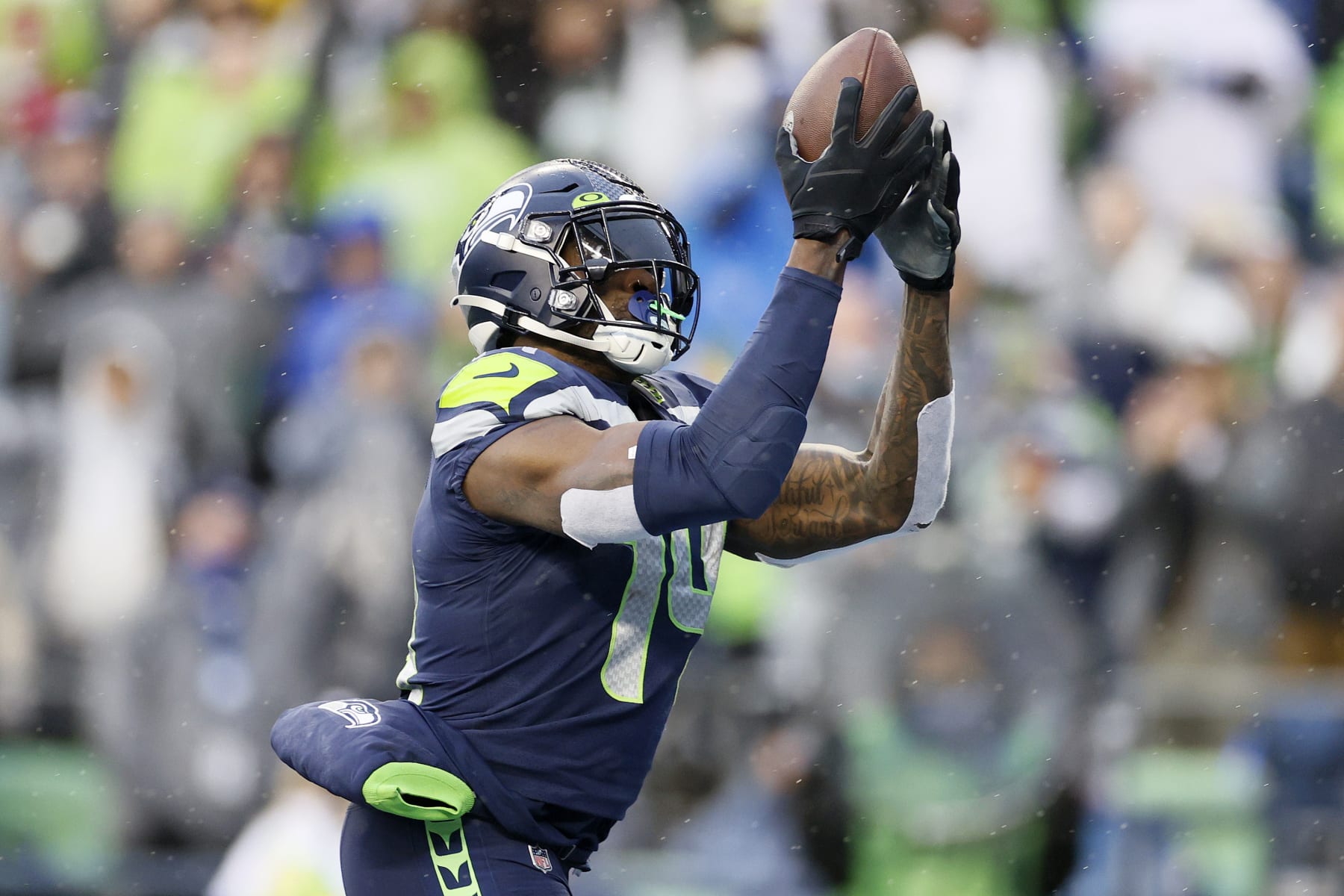 Seattle Seahawks wide receiver DK Metcalf outruns New Orleans Saints wide  receiver Michael Thomas and wide receiver Treylon Burks