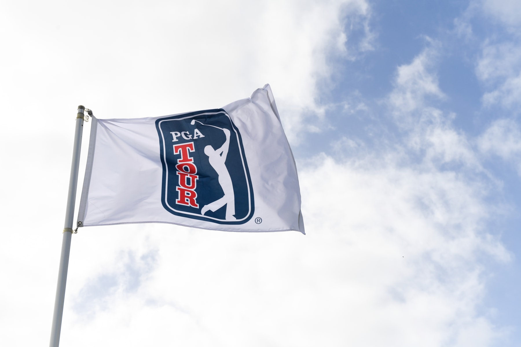 GREAT EXUMA, BAHAMAS - JANUARY 12: PGA TOUR flag during the first round of the Korn Ferry Tour's The Bahamas Great Exuma Classic at Sandals Emerald Bay golf course on January 12, 2020 in Great Exuma, Bahamas. (Photo by Ben Jared/PGA TOUR via Getty Images) GREAT EXUMA, BAHAMAS - JANUARY 12: PGA TOUR flag during the first round of the Korn Ferry Tour's The Bahamas Great Exuma Classic at Sandals Emerald Bay golf course on January 12, 2020 in Great Exuma, Bahamas. (Photo by Ben Jared/PGA TOUR via Getty Images)