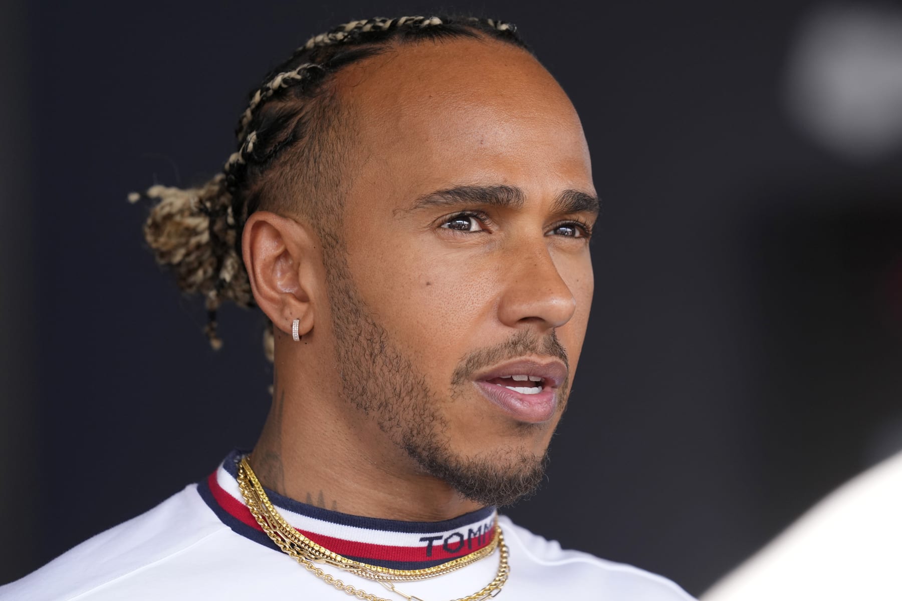 F1 star Lewis Hamilton joins new Denver Broncos ownership group - ESPN